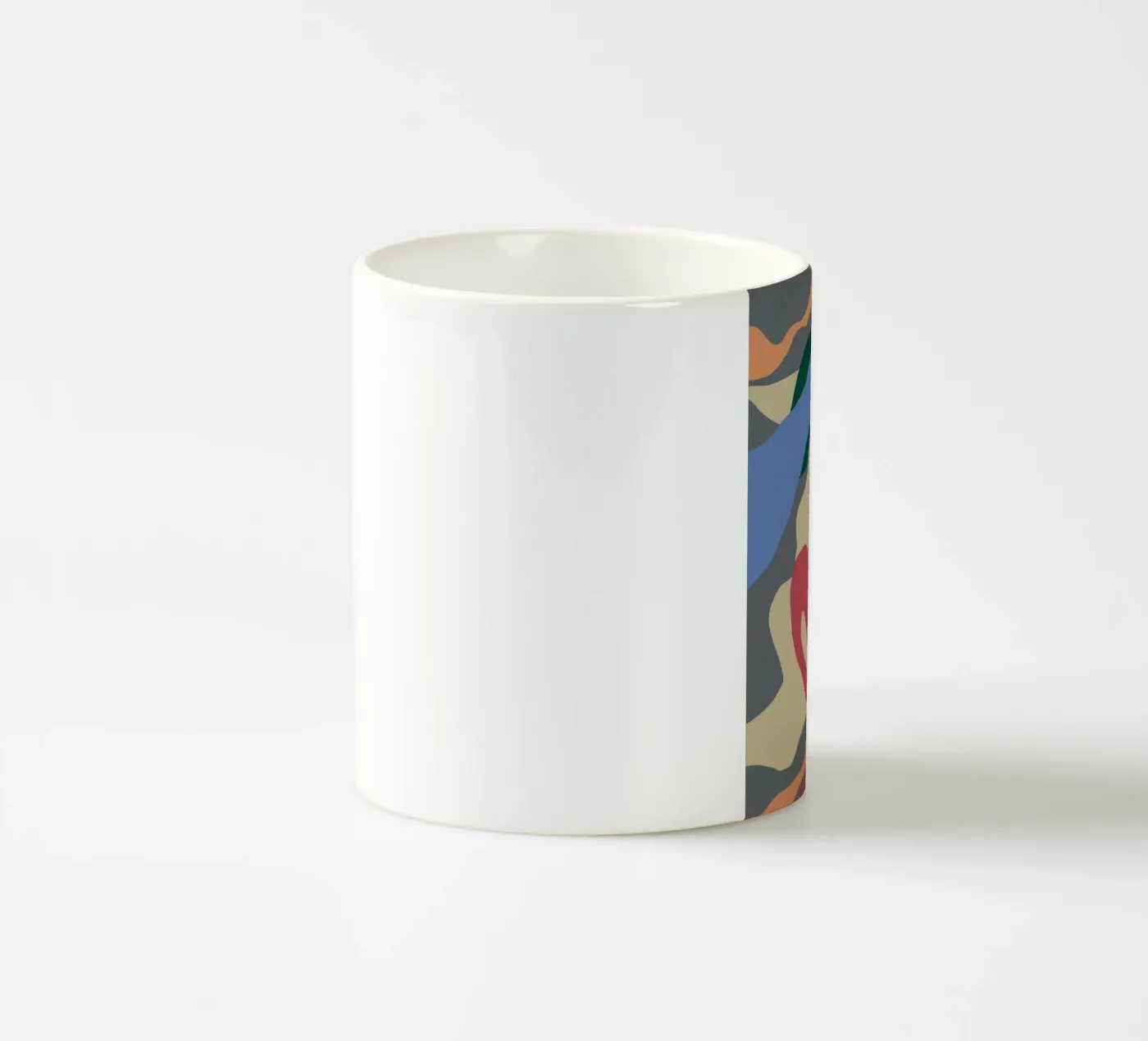 Color splat pattern ceramic mug by Little Dean