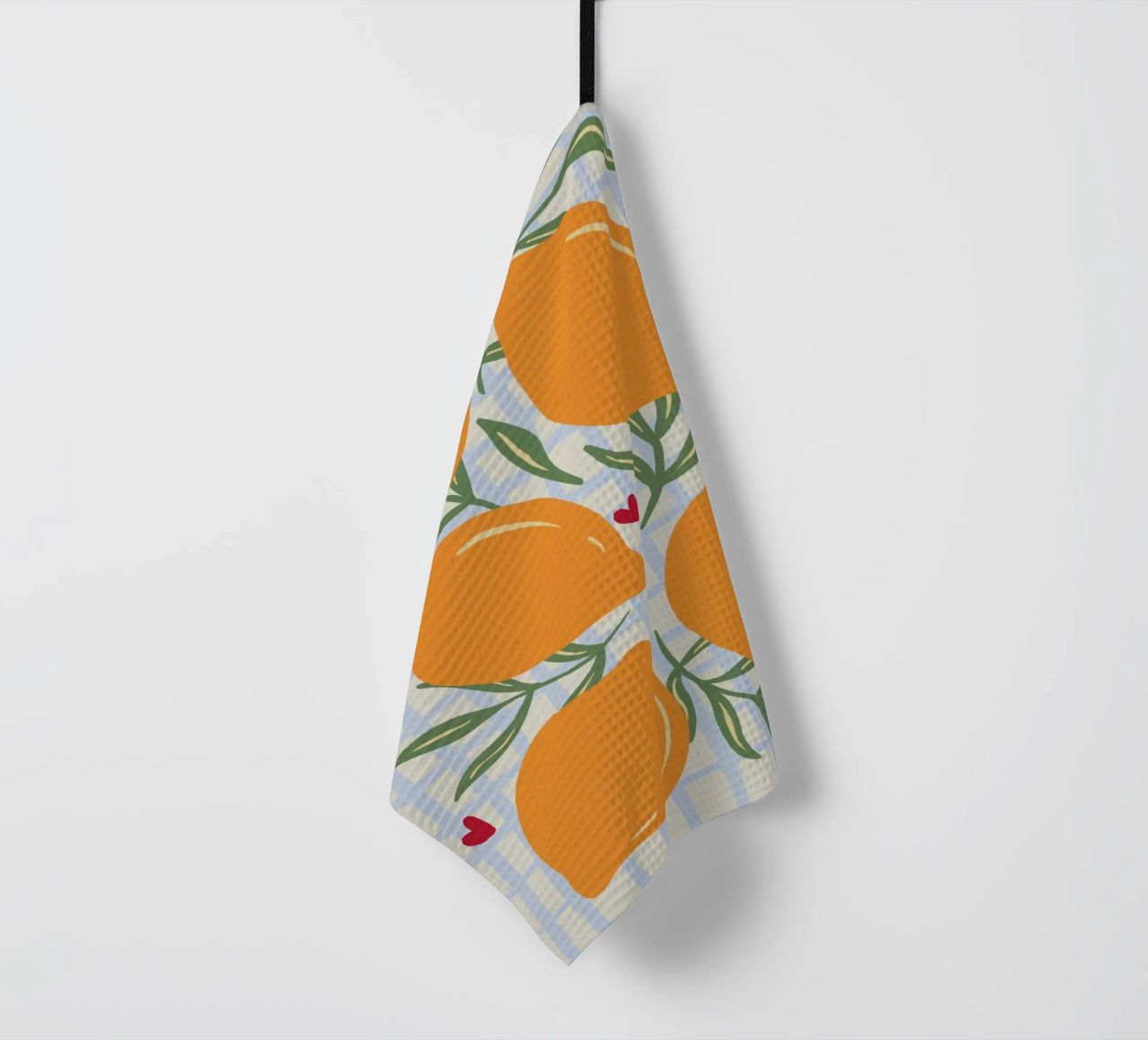 Lemons on a grid pattern tea towel by Wackapacka