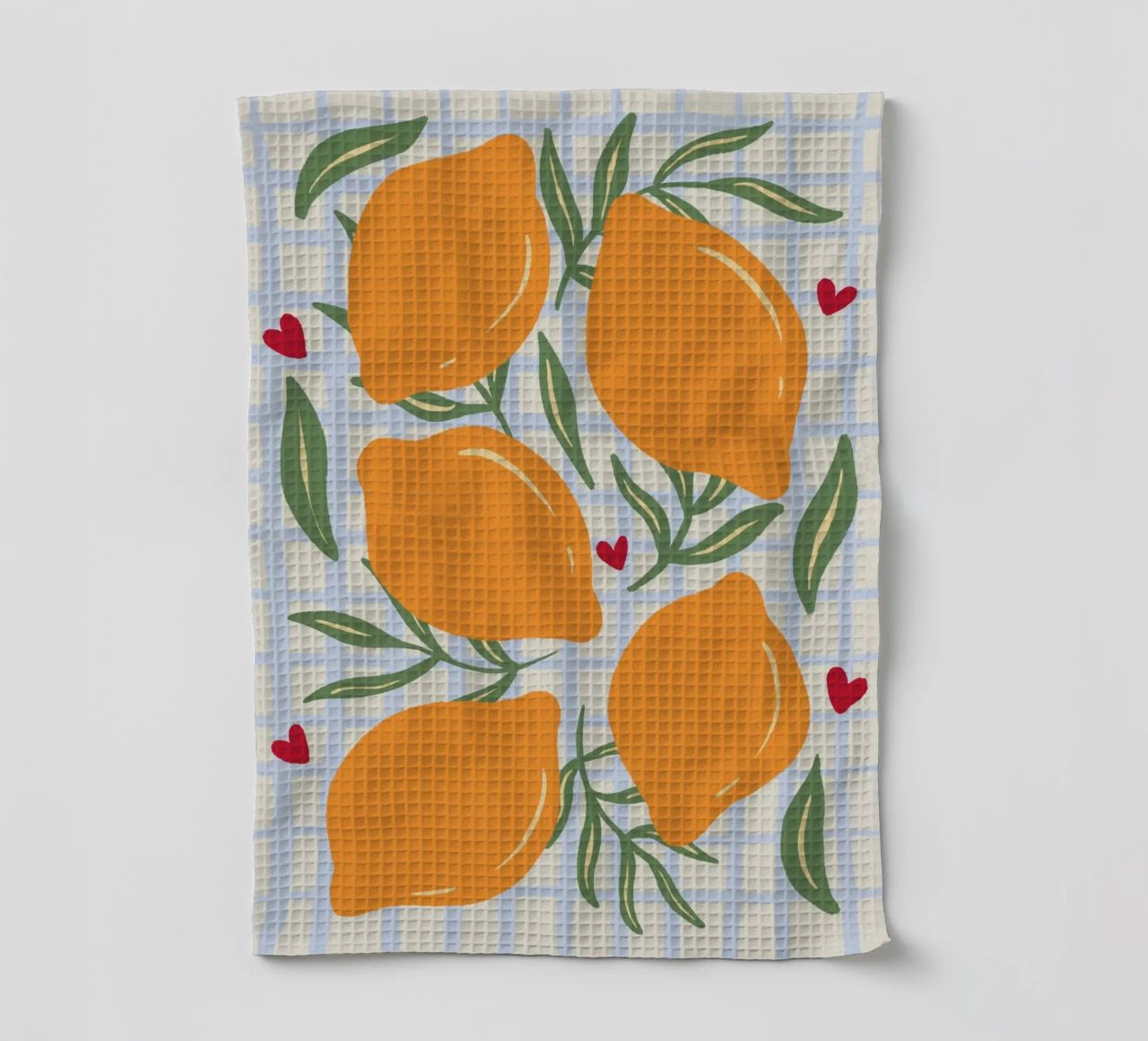 Lemons on a grid pattern tea towel by Wackapacka