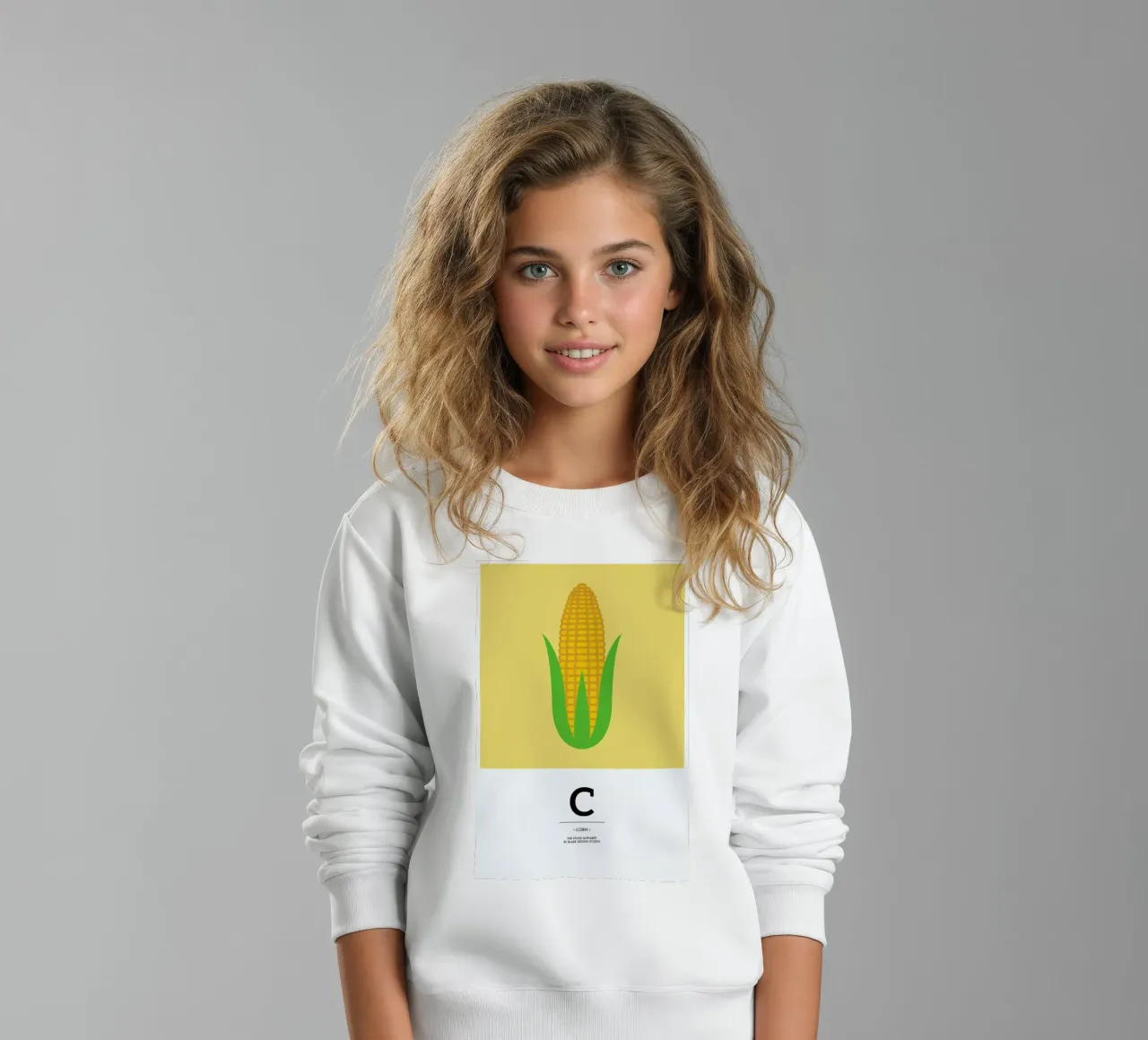„The Food Alphabet“ - C like Corn felpa bambino da BLAEK Design Studio