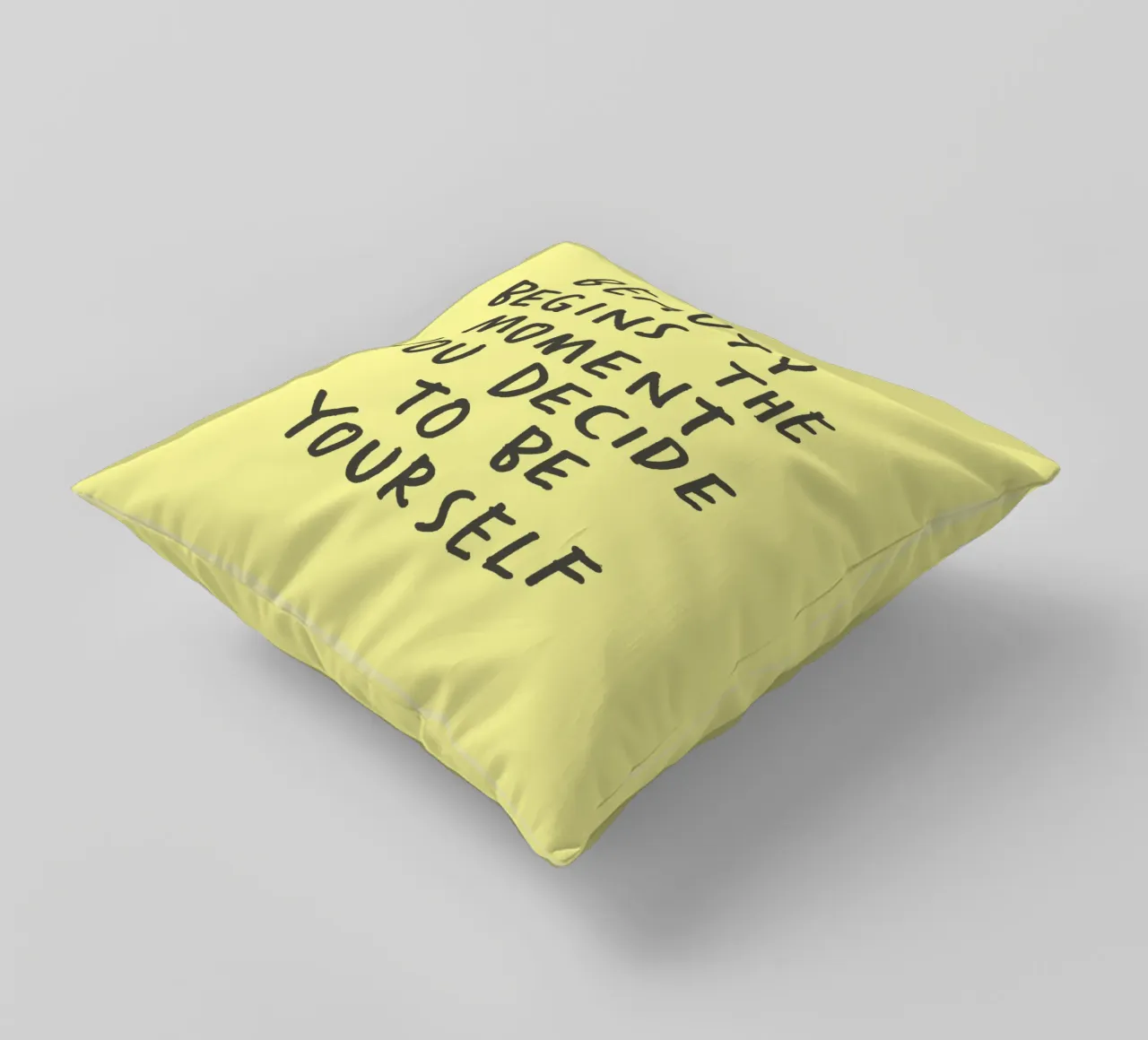 La bellezza inizia nel momento in cui si decide di essere se stessi cuscino da THE MOTIVATED TYPE