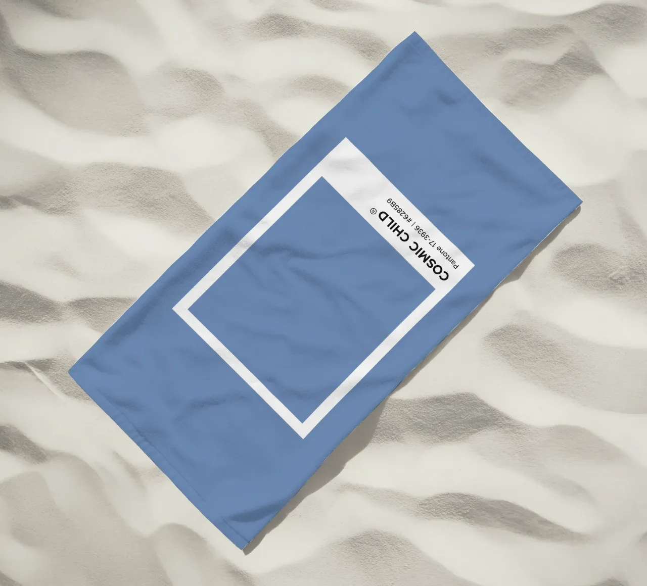 Bambino cosmico Pantone telo mare da Paigaam Studio