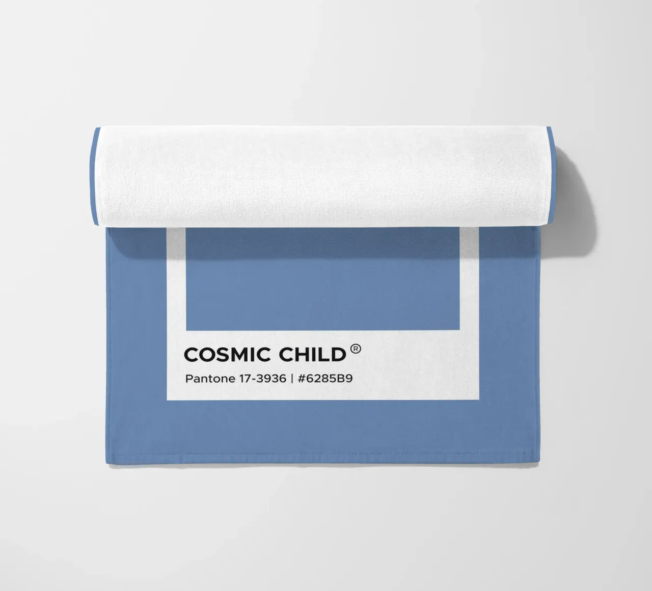 Bambino cosmico Pantone telo mare da Paigaam Studio