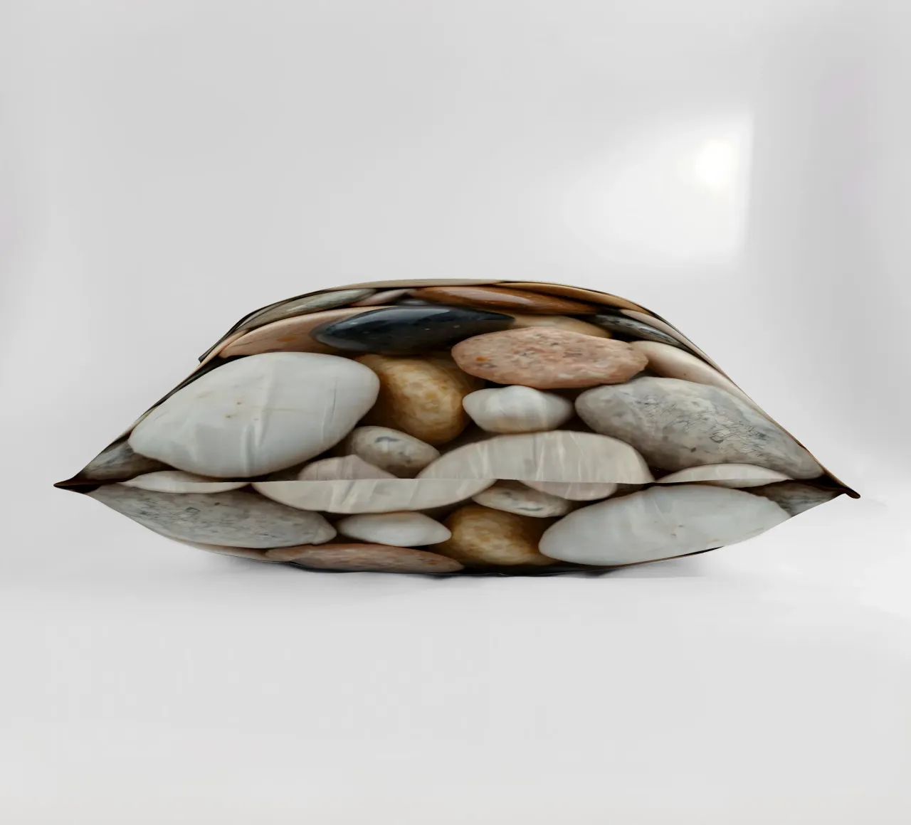 Collezione di pietre di fiume lisce di vari colori e dimensioni cuscino da DesignDoodle