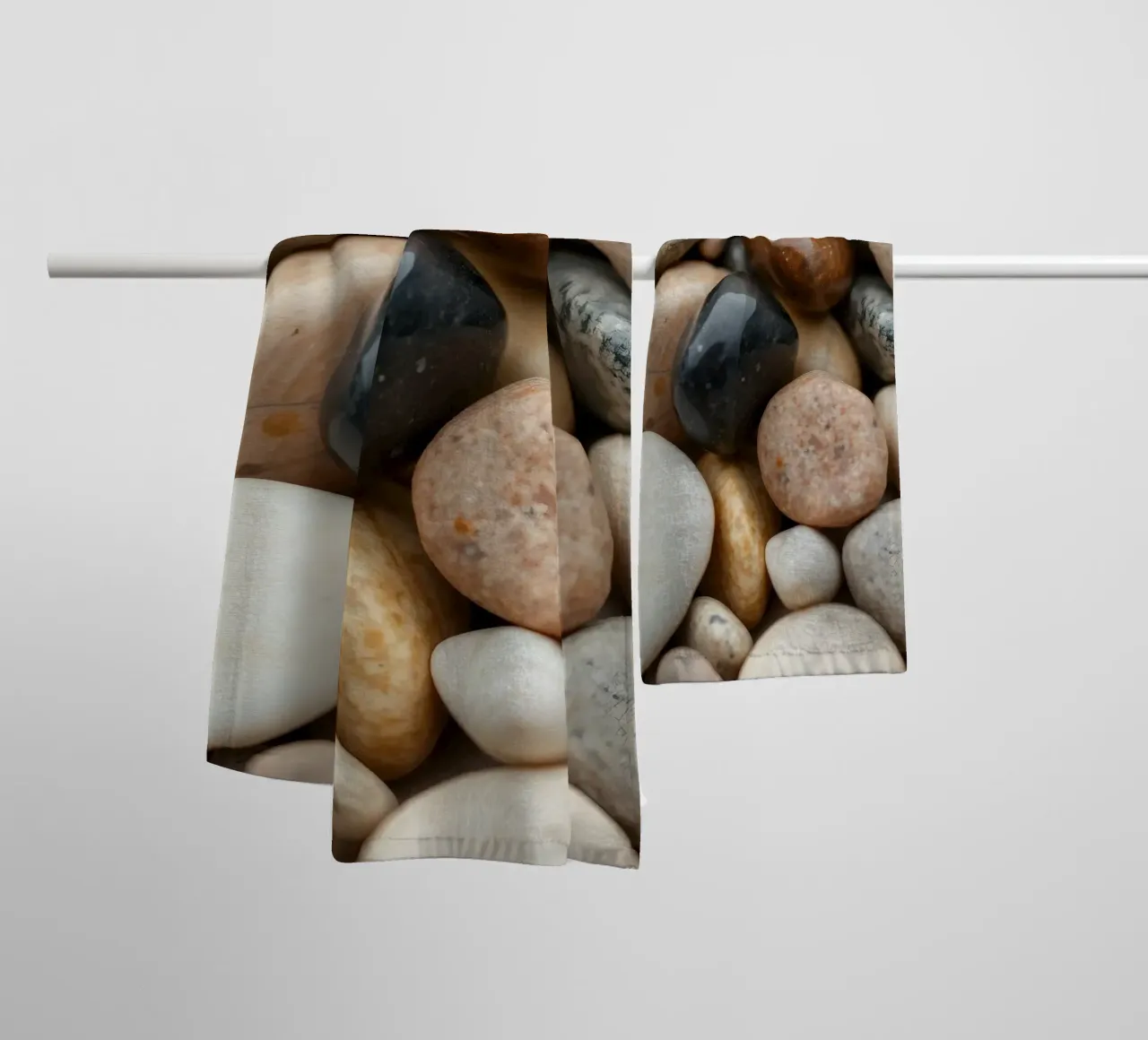 Collection of smooth river stones in various colors and size towel by DesignDoodle