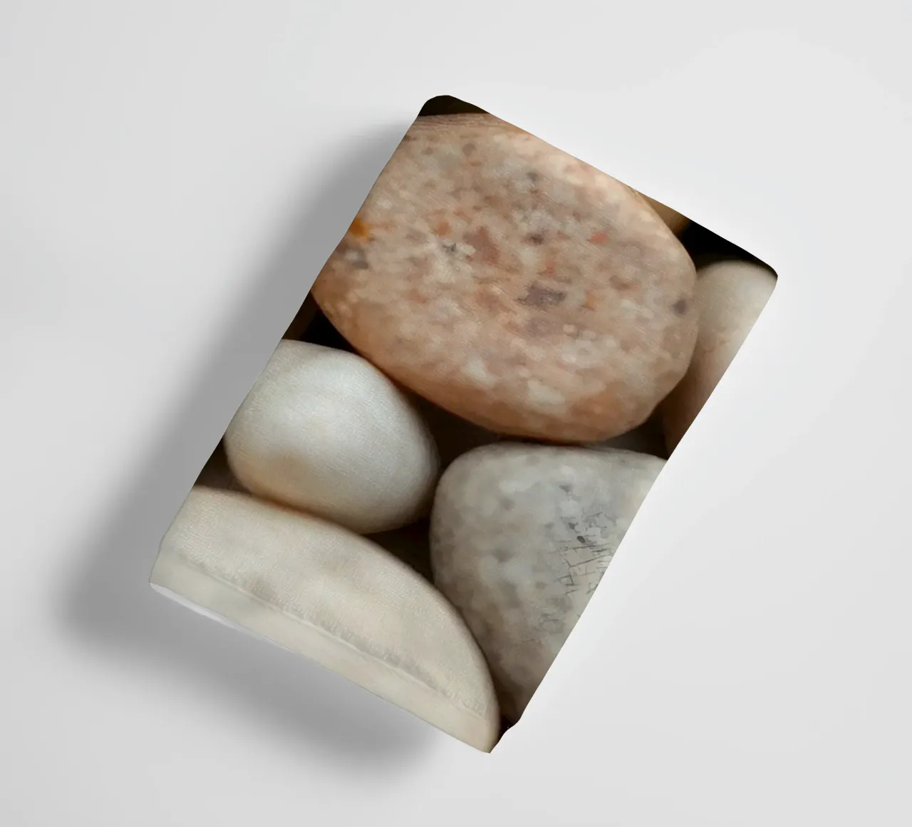 Collection of smooth river stones in various colors and size towel by DesignDoodle