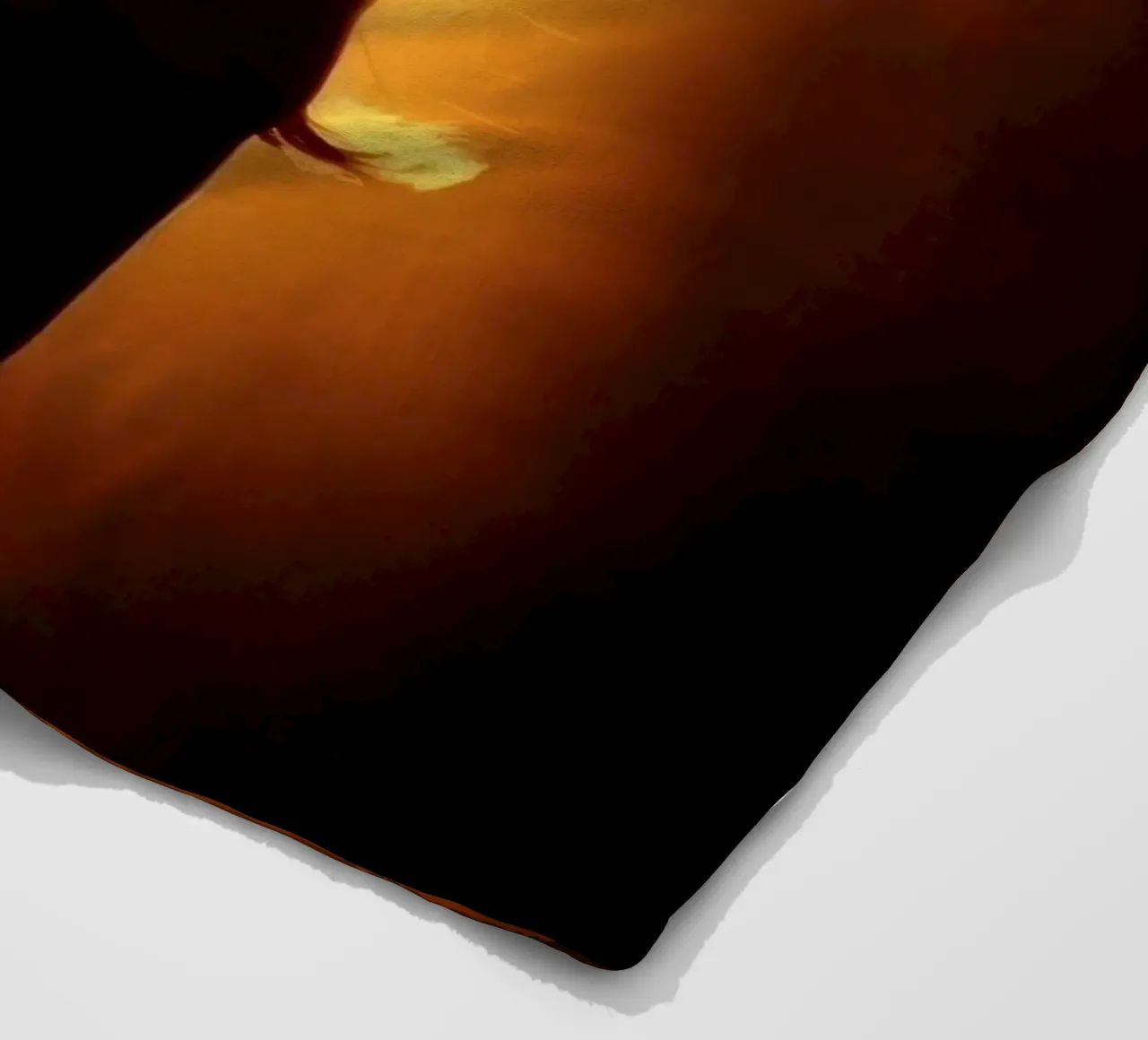 Silhouette of a woman against a warm glowing backdrop fleece blanket by DesignDoodle