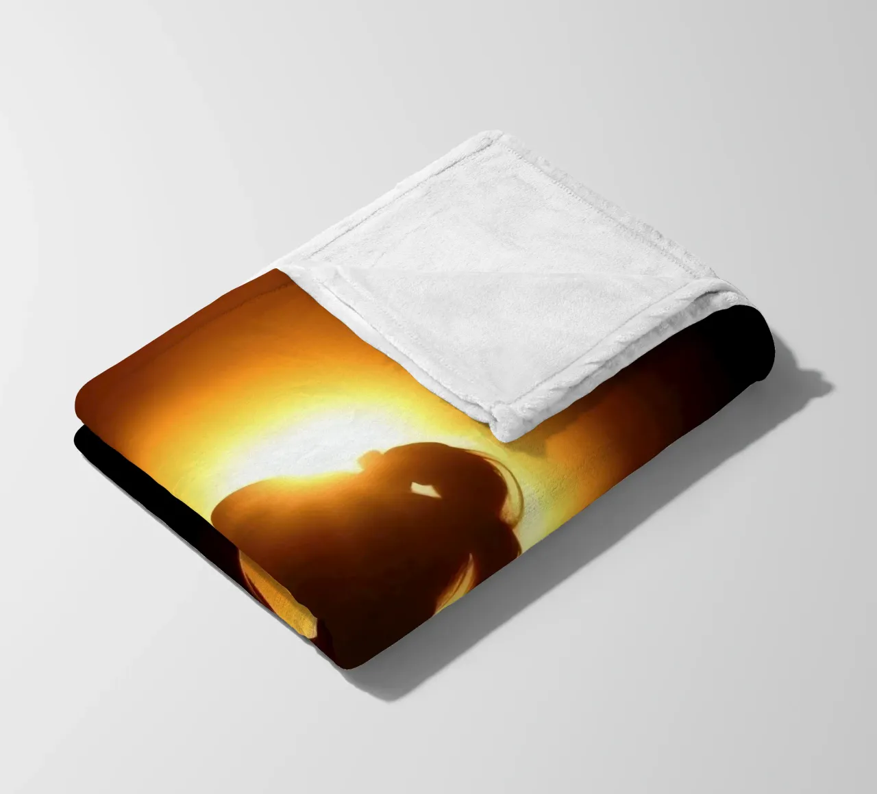 Silhouette of a woman against a warm glowing backdrop fleece blanket by DesignDoodle