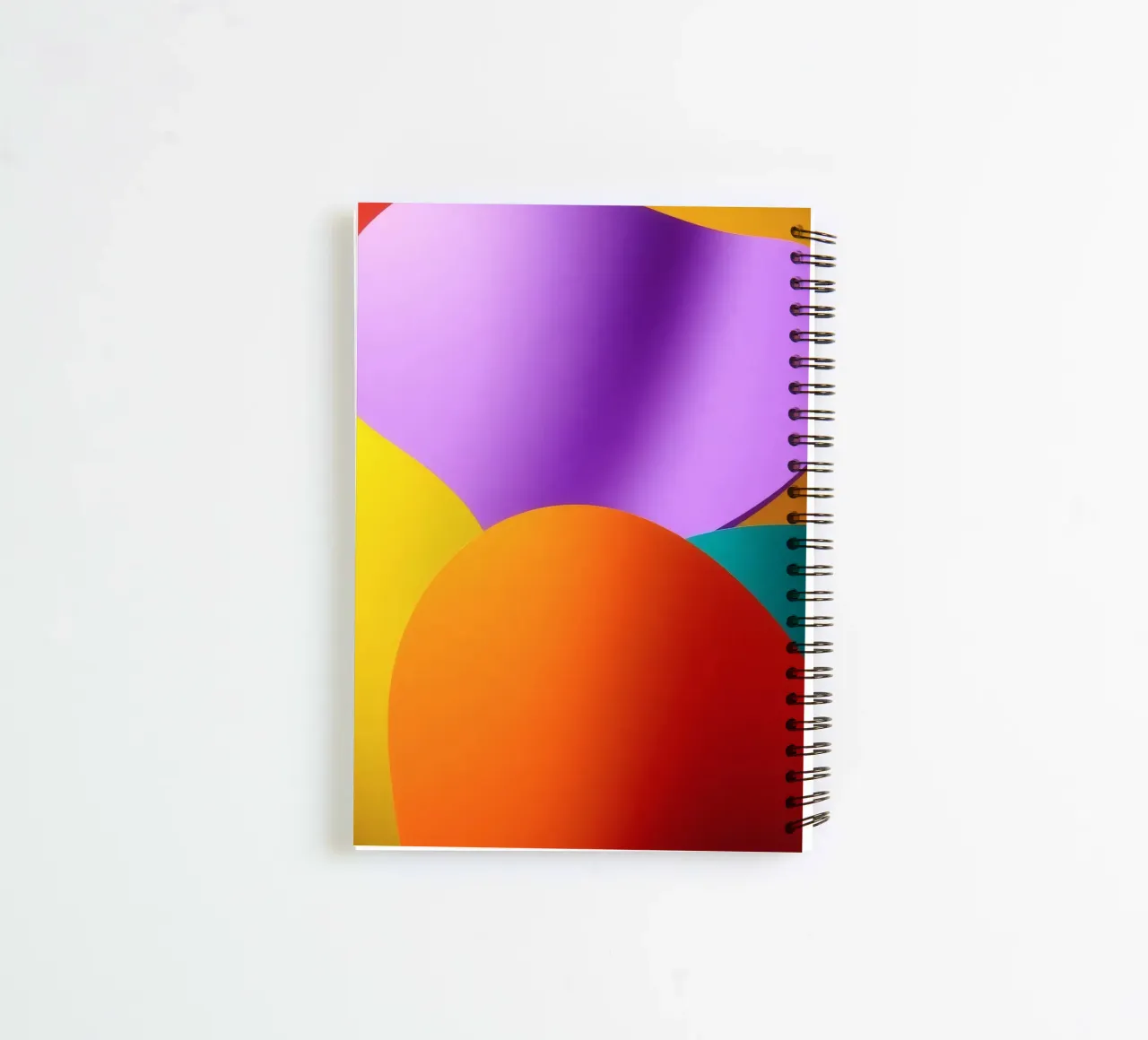 Colorful abstract shapes blend together in a vibrant art spiral notebook by DesignDoodle