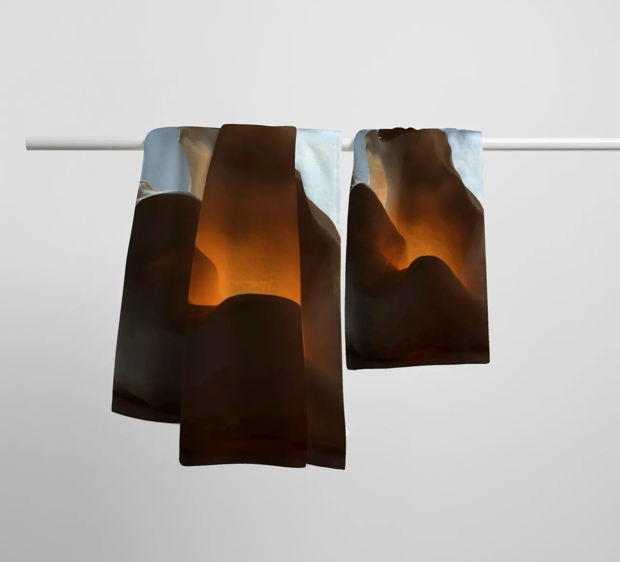 Artistic sculpture emits warm glow amidst mist and light towel by DesignDoodle