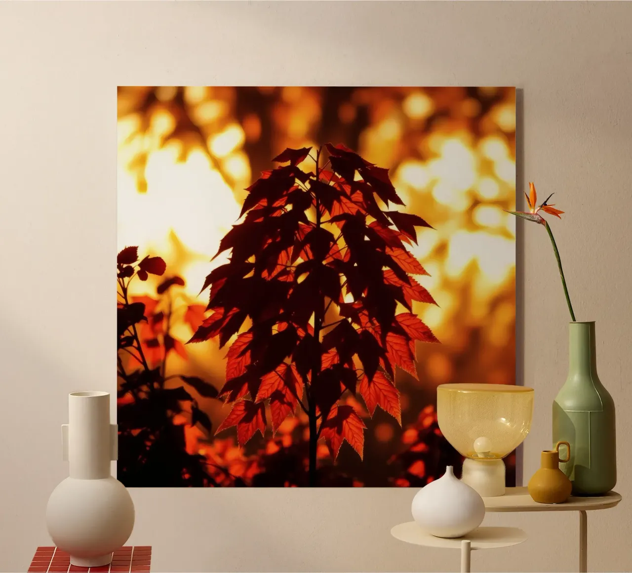 Silhouette of autumn leaves against a glowing sunset acrylic glass by DesignDoodle