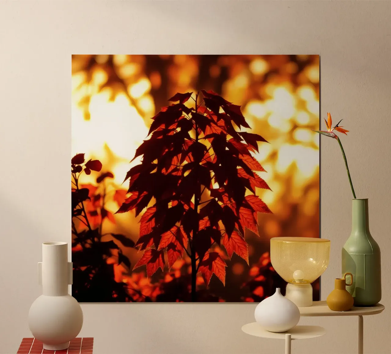 Silhouette of autumn leaves against a glowing sunset hahnemühle by DesignDoodle