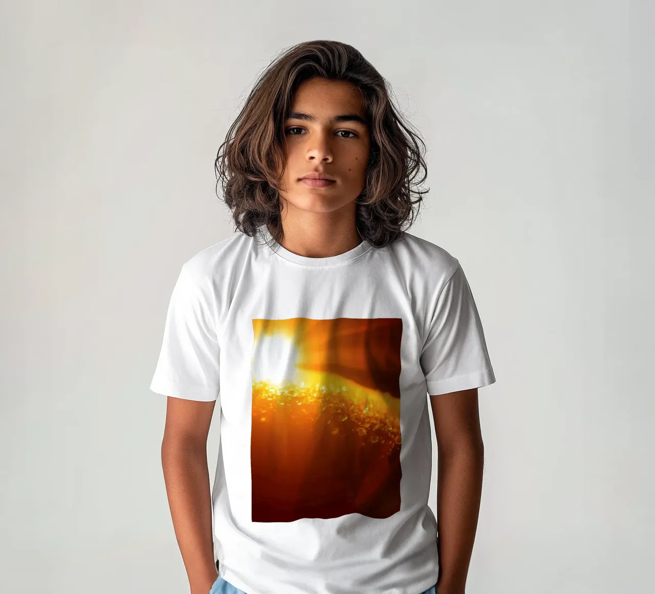 Sunlight glistens on a dewy surface at dawn, creating a warm kids t-shirt by DesignDoodle