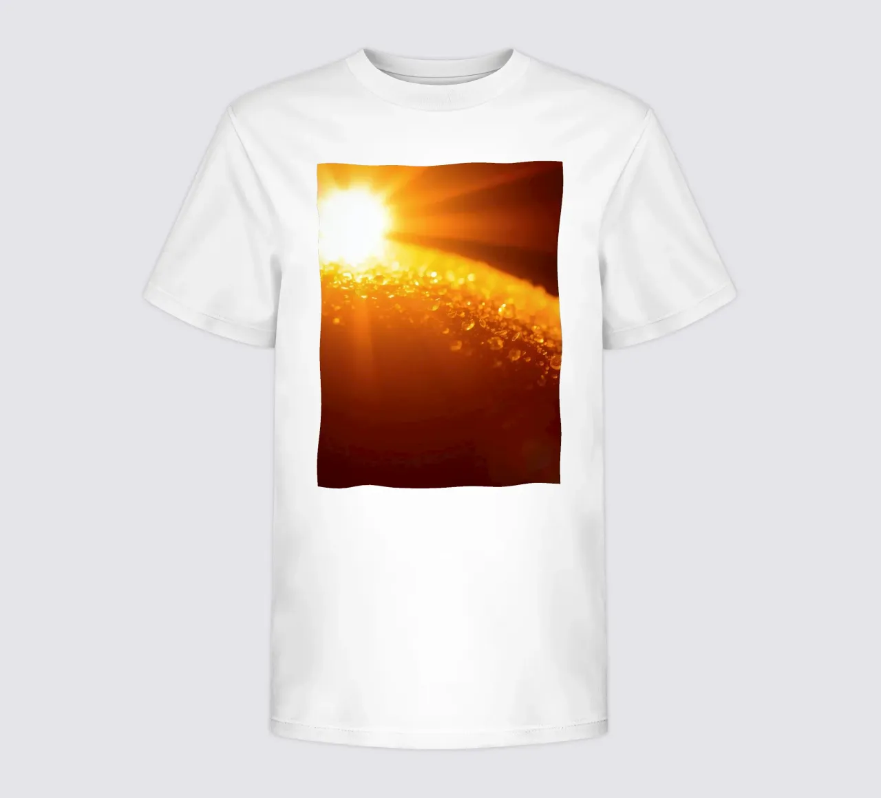 Sunlight glistens on a dewy surface at dawn, creating a warm kids t-shirt by DesignDoodle