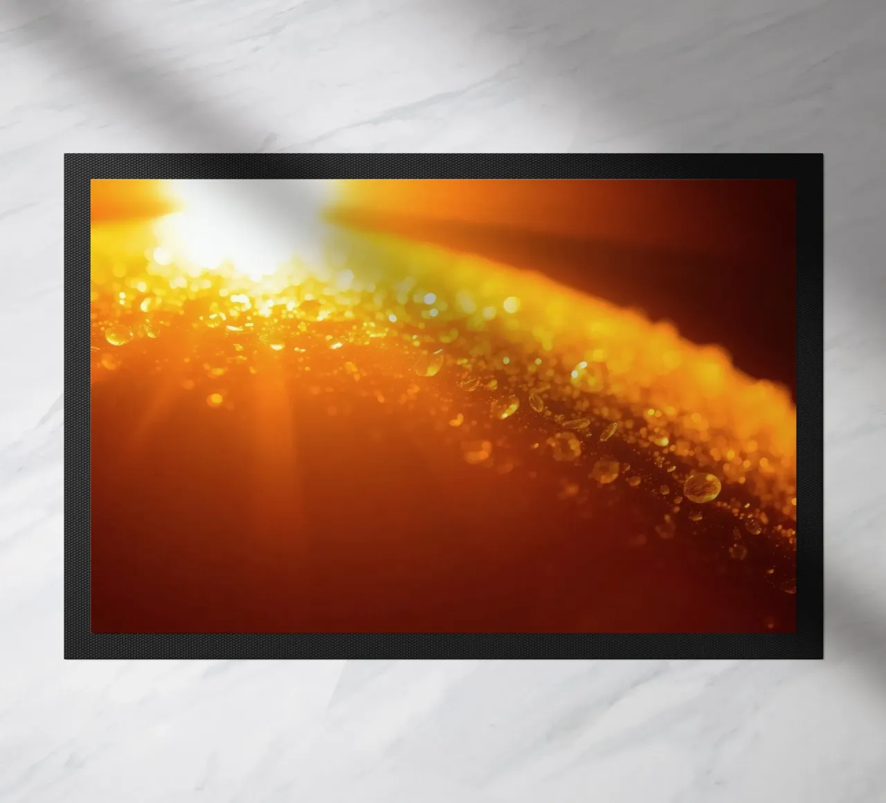 Sunlight glistens on a dewy surface at dawn, creating a warm doormat by DesignDoodle