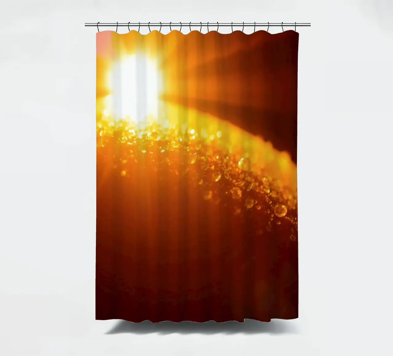 Sunlight glistens on a dewy surface at dawn, creating a warm shower curtain by DesignDoodle