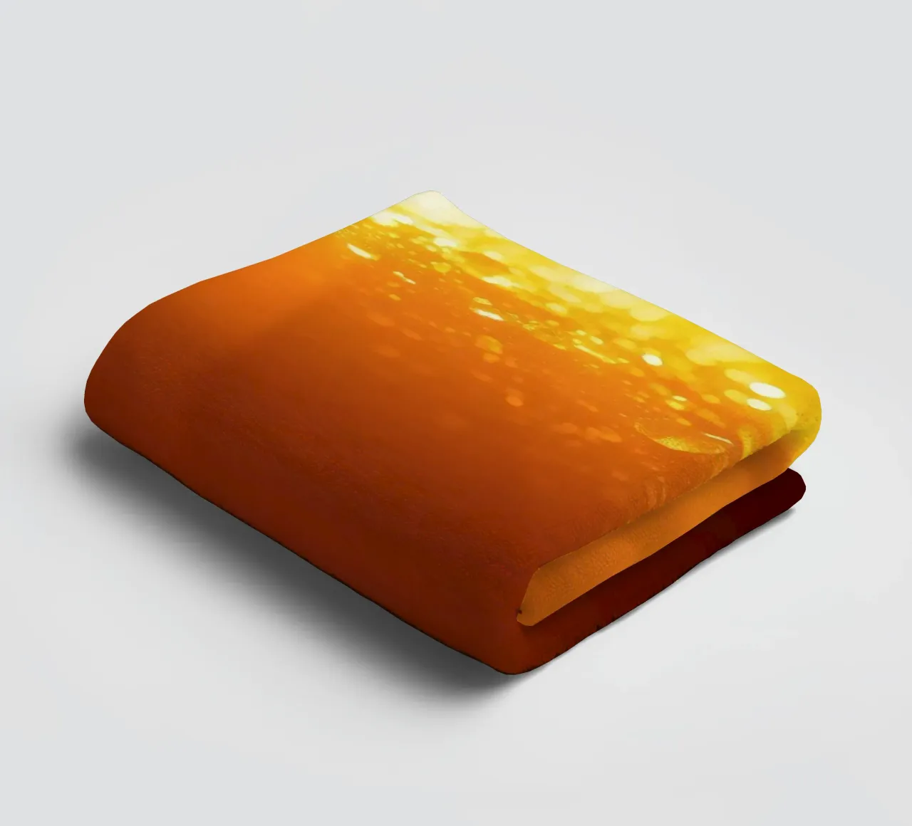 Sunlight glistens on a dewy surface at dawn, creating a warm towel by DesignDoodle