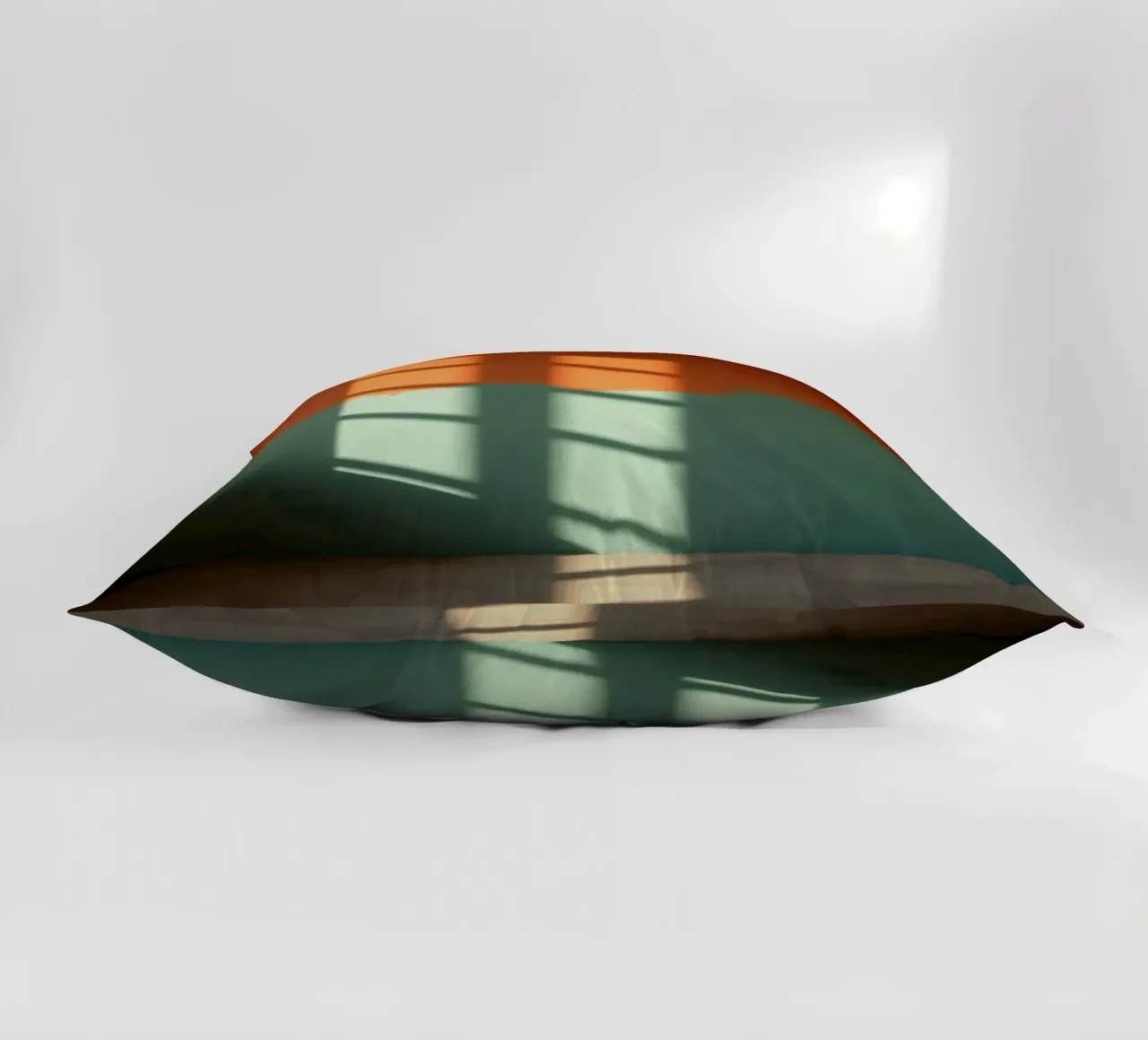 Gioco di luci e ombre su una parete colorata in una stanza illuminata dal sole. cuscino da DesignDoodle