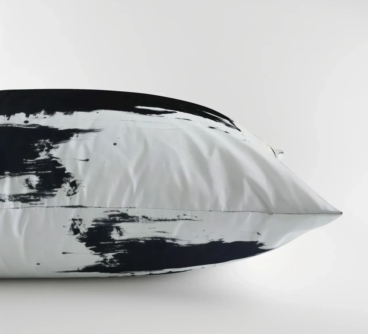 Abstract black and white artwork featuring bold brush stroke decorative cushion by DesignDoodle