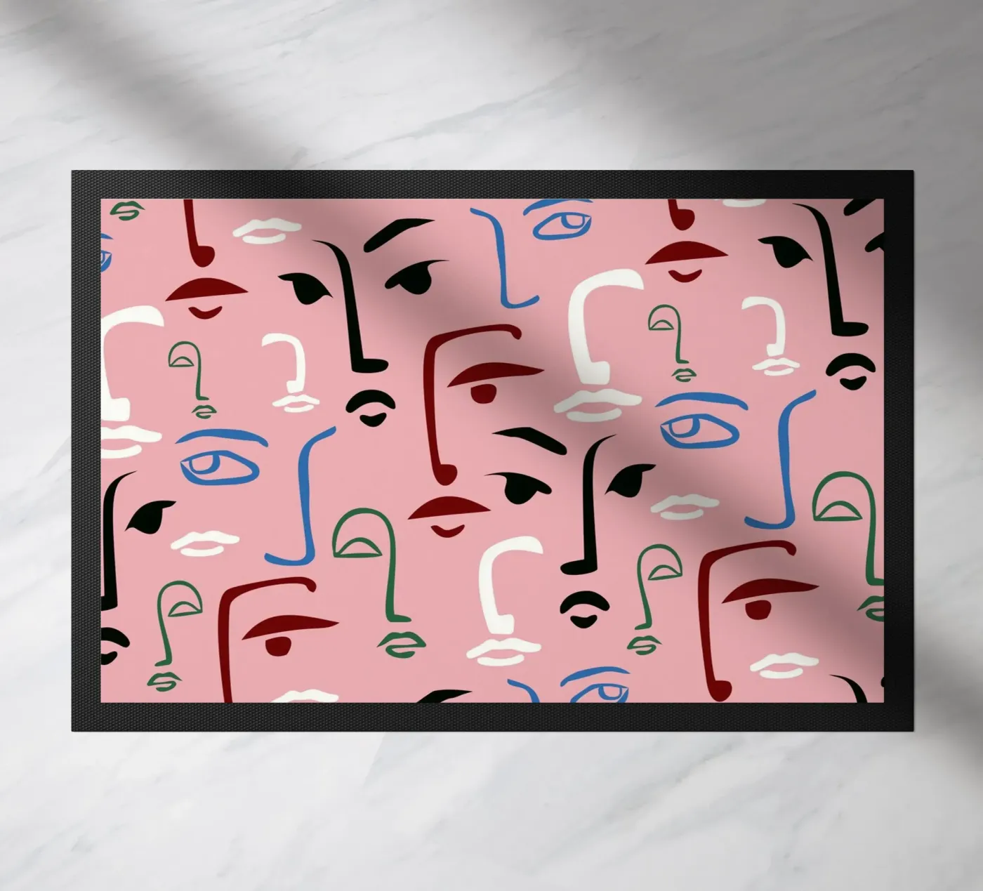 Monochrome Faces doormat by Kintsugi99