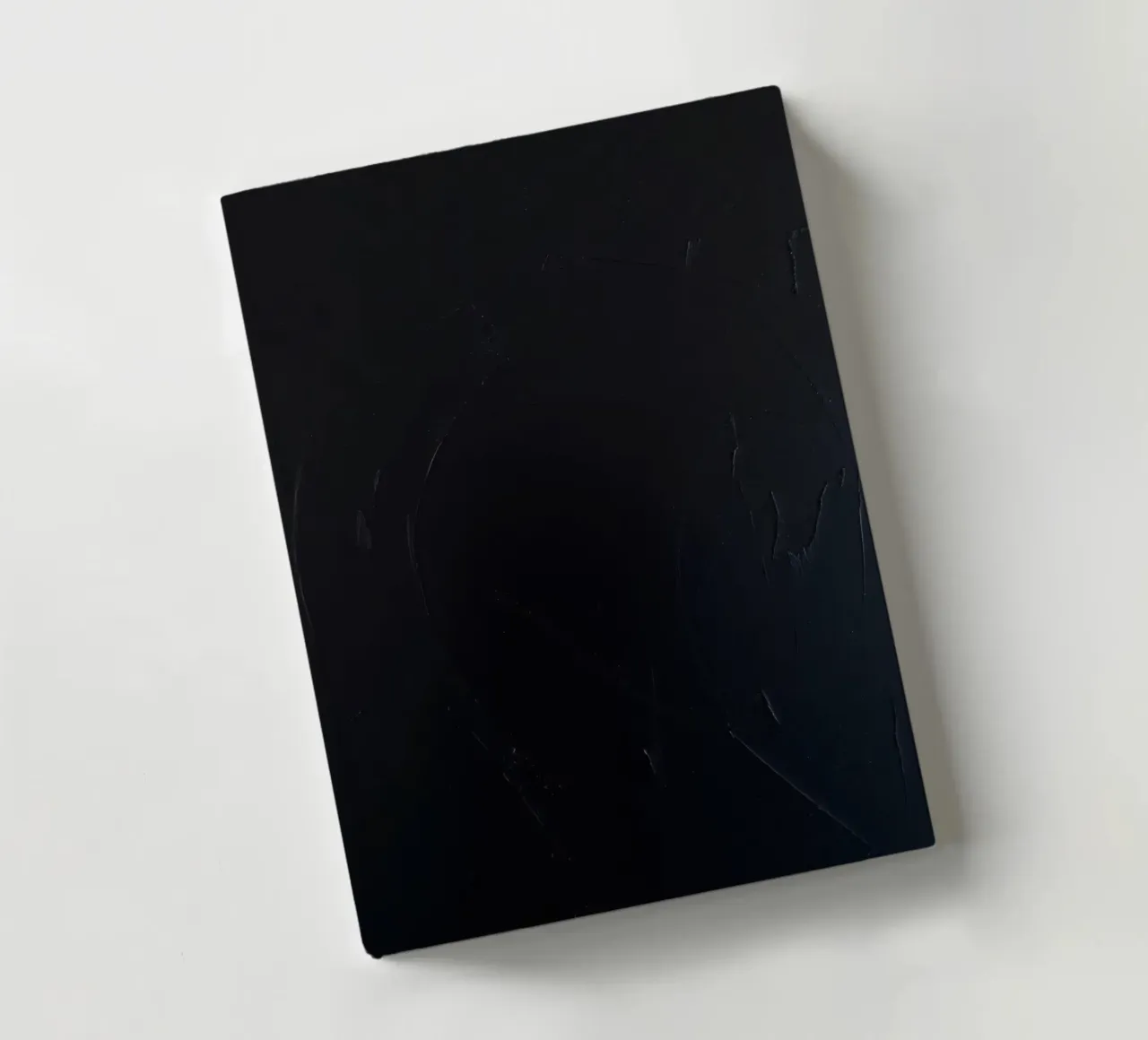 Dark textured surface with subtle variations in hues notebook by DesignDoodle