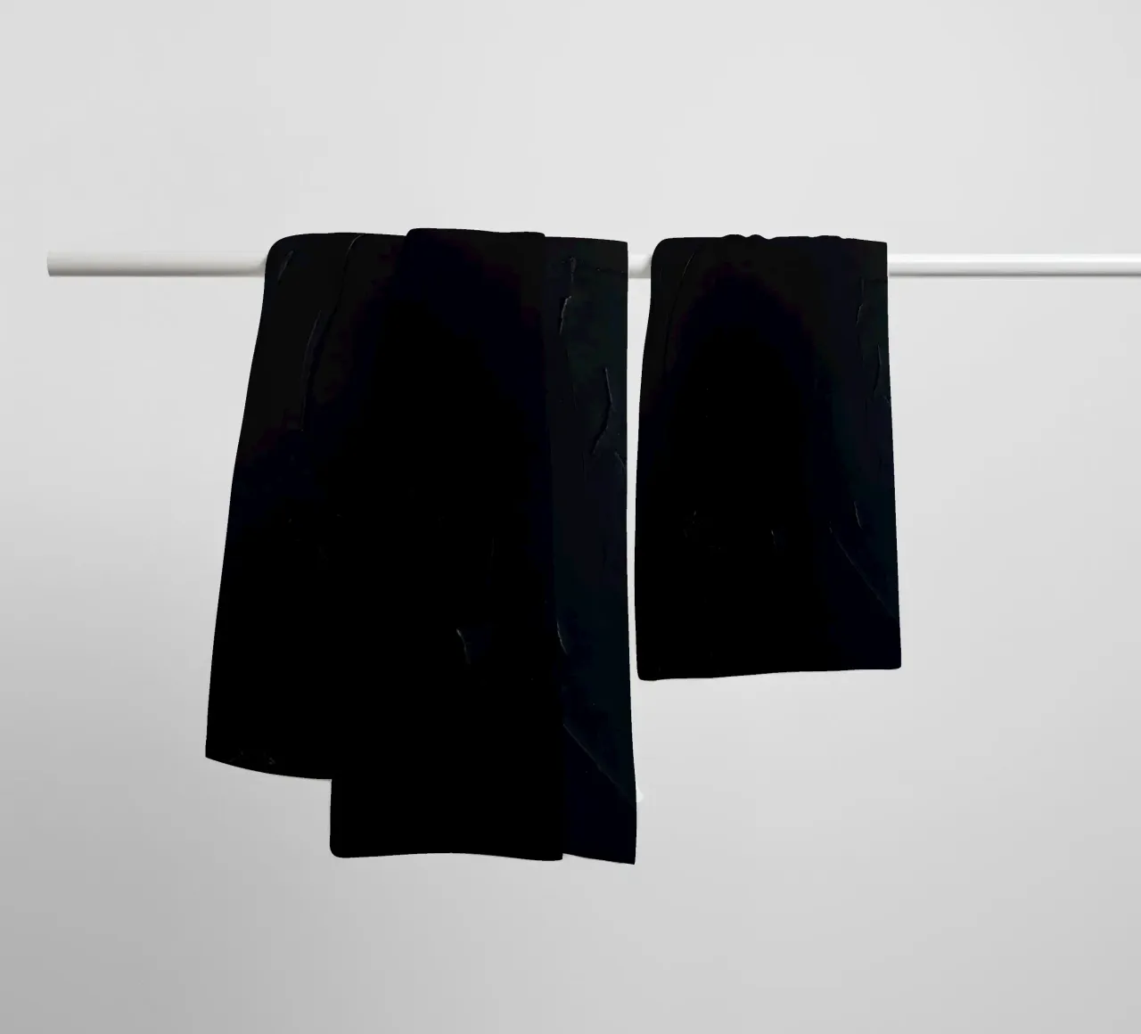 Dark textured surface with subtle variations in hues towel by DesignDoodle