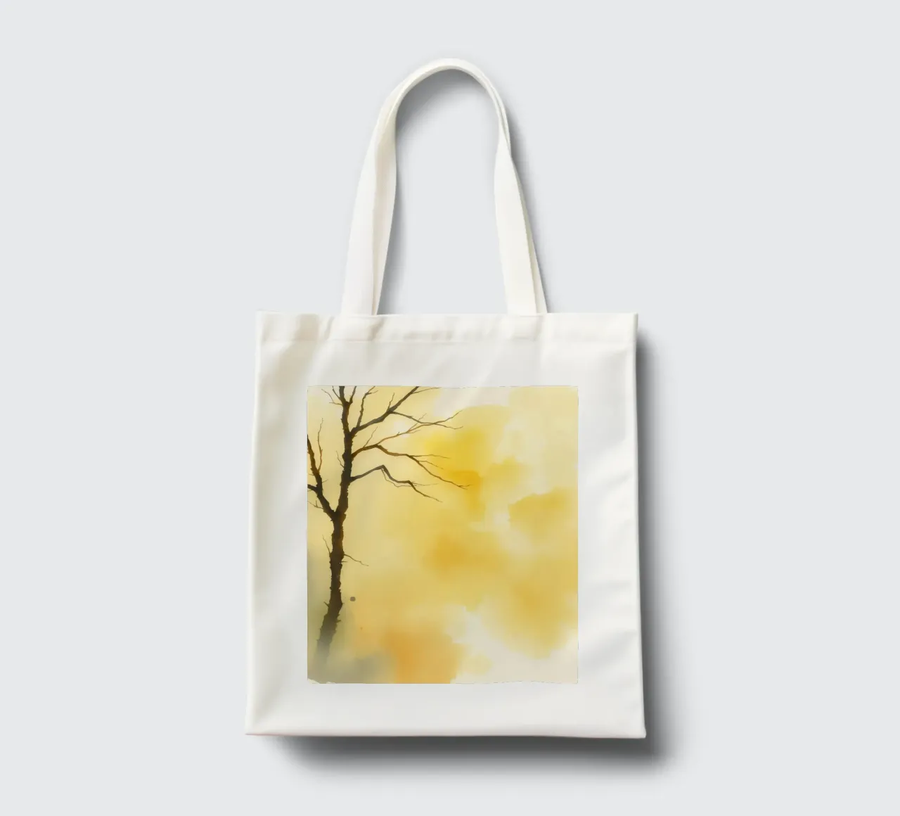 tree against a warm yellow background in a watercolor art tote bag by DesignDoodle