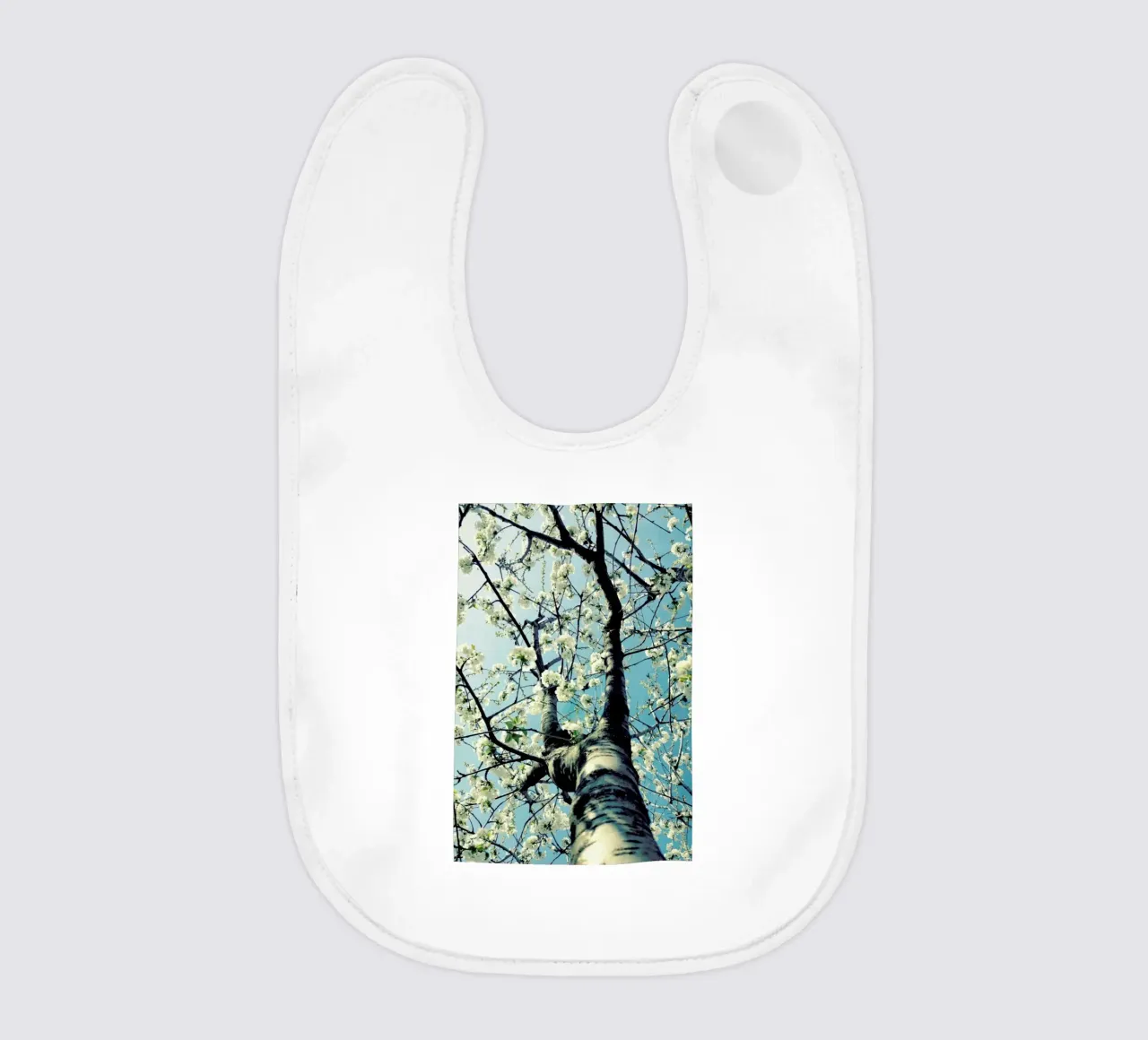 Under The Cherry Tree baby bib by Angelo Cerantola