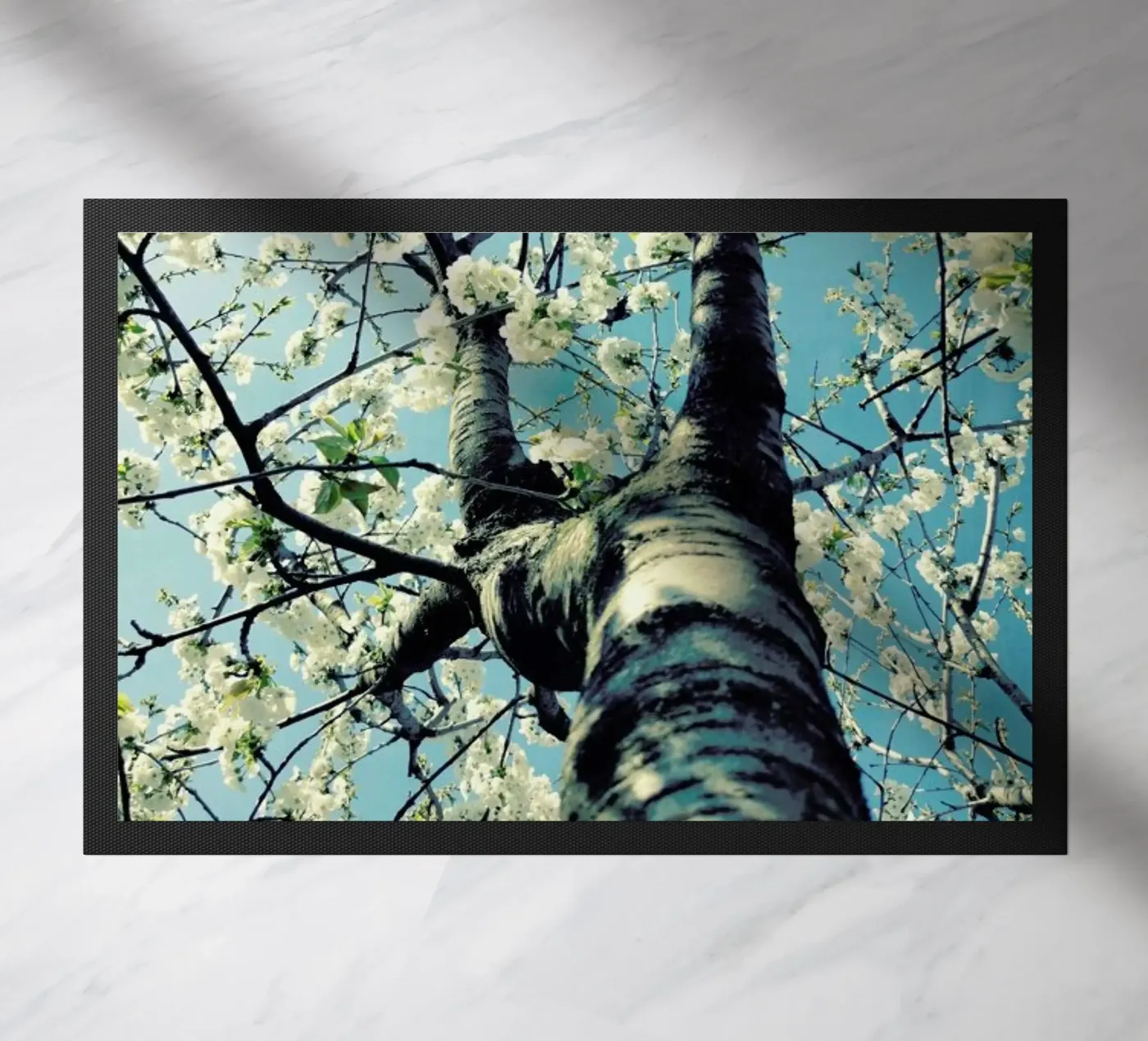 Under The Cherry Tree doormat by Angelo Cerantola