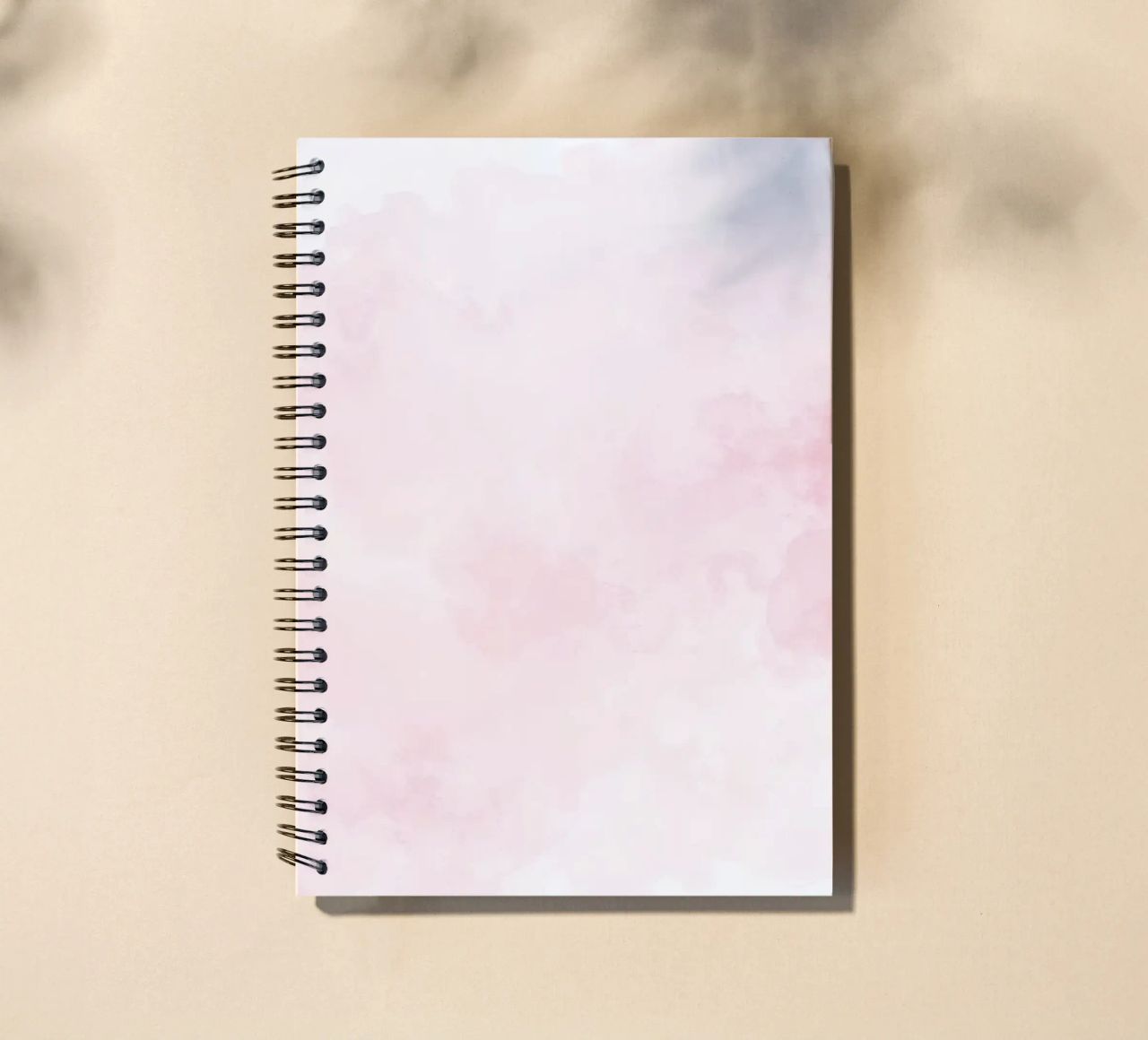 Soft pastel clouds create a serene atmosphere in a tranquil spiral notebook by DesignDoodle