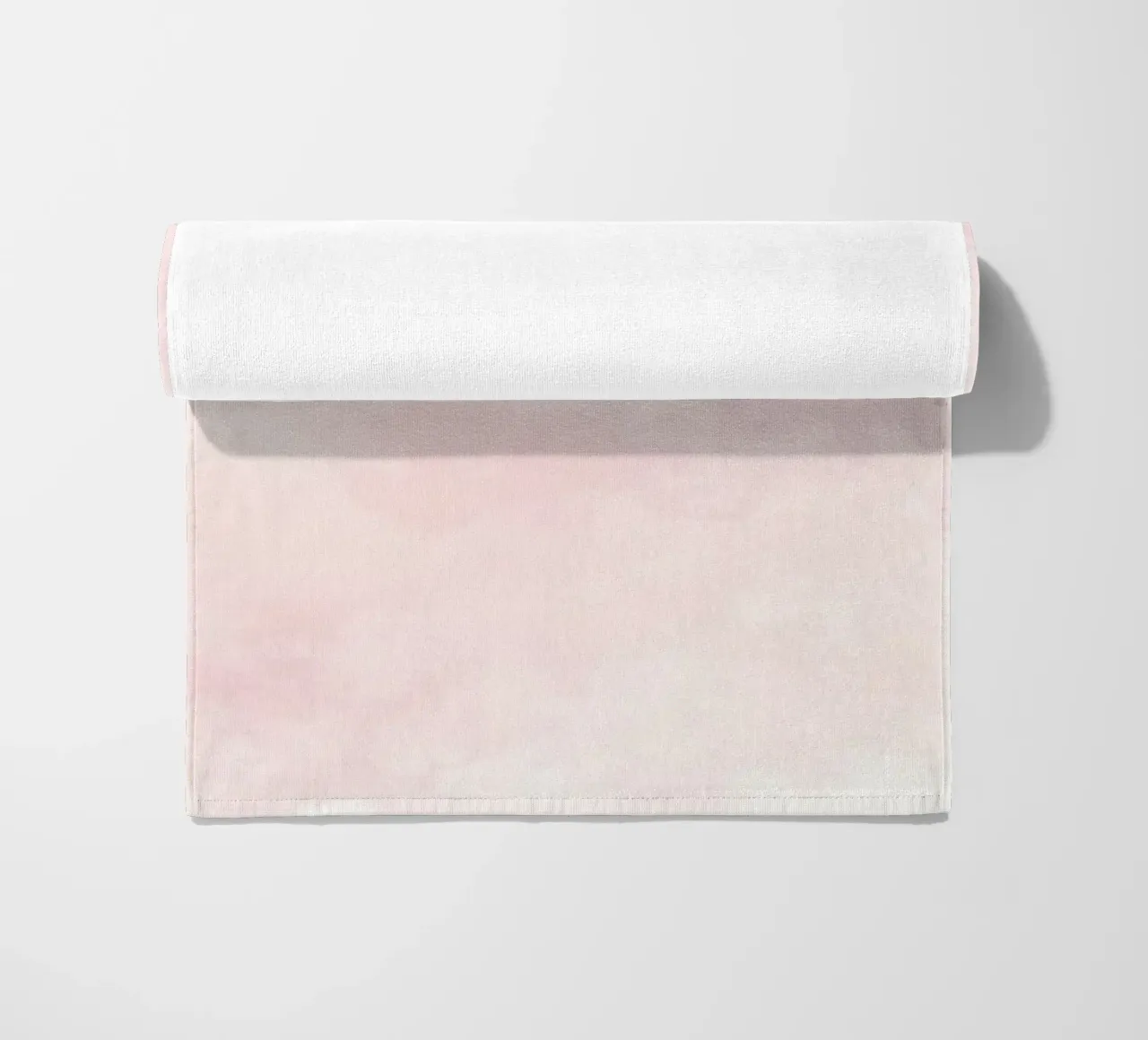 Soft pastel clouds create a serene atmosphere in a tranquil beach towel by DesignDoodle
