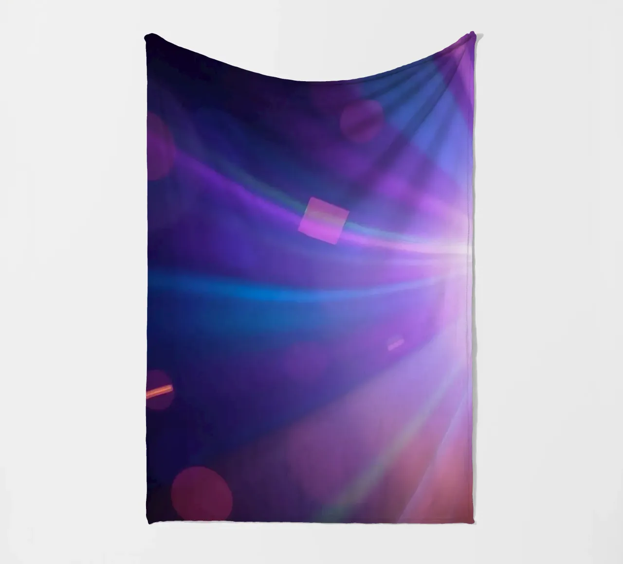 Colorful light rays create a vibrant display in a dark art fleece blanket by DesignDoodle