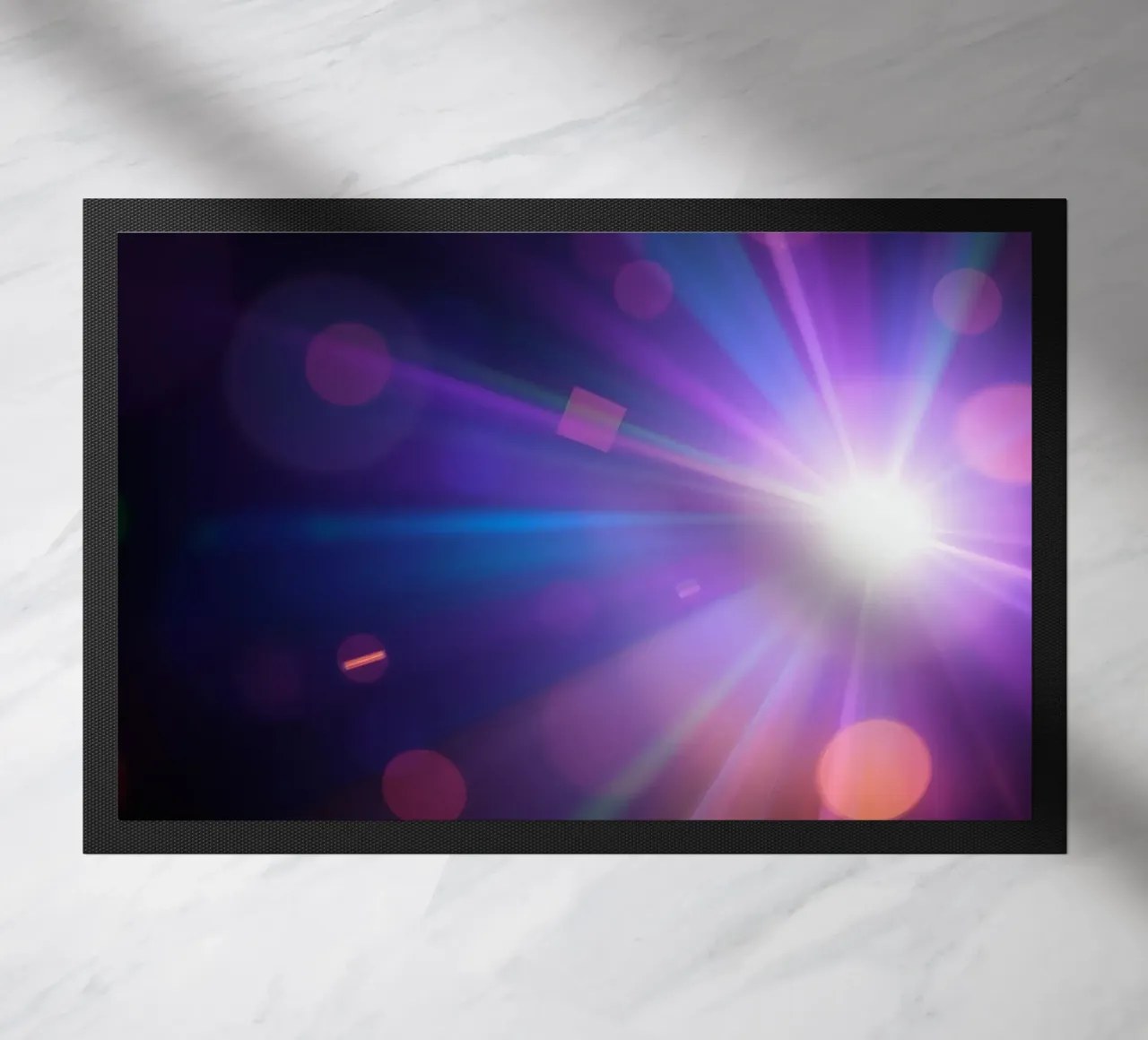 Colorful light rays create a vibrant display in a dark art doormat by DesignDoodle