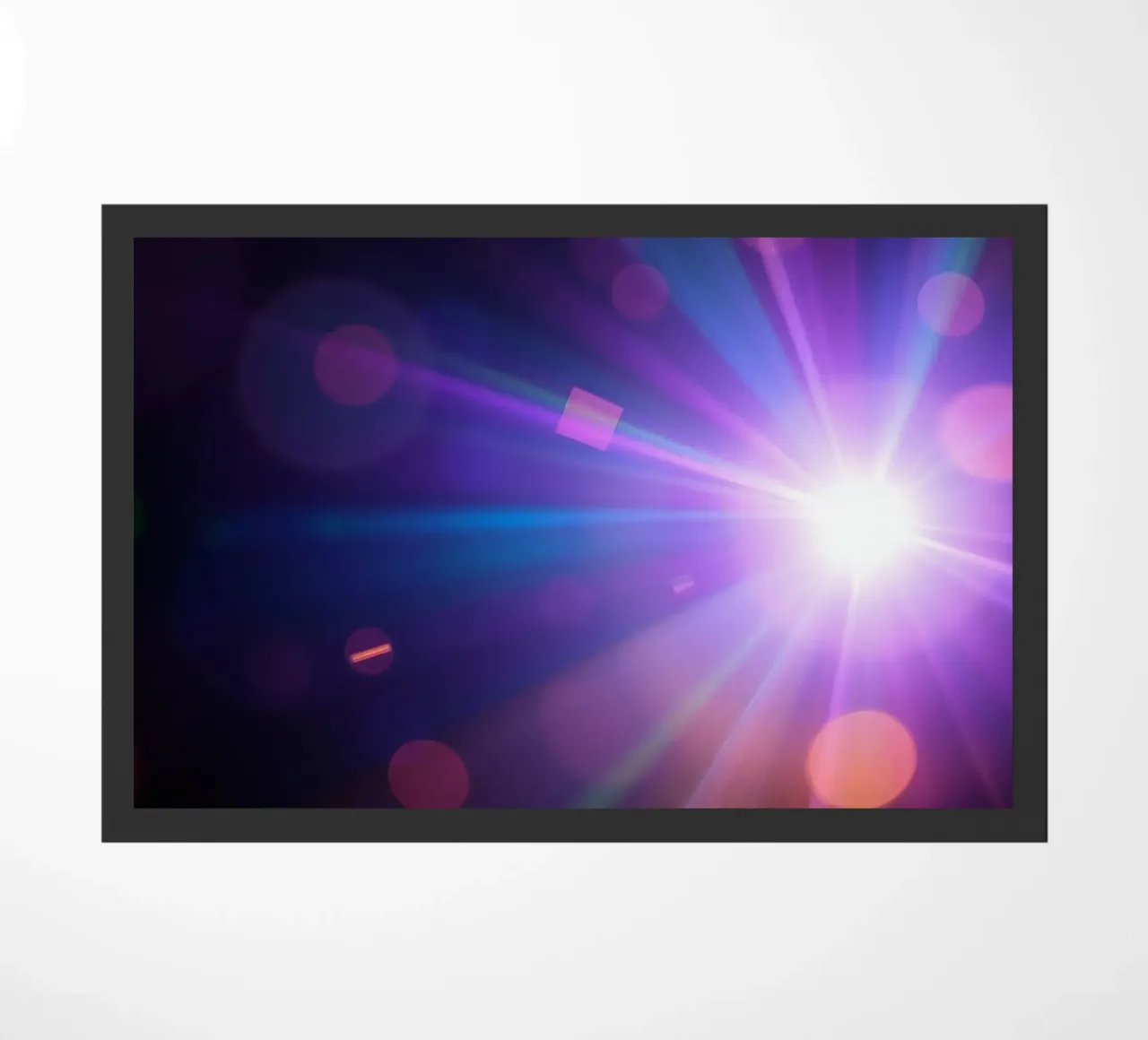 Colorful light rays create a vibrant display in a dark art doormat by DesignDoodle