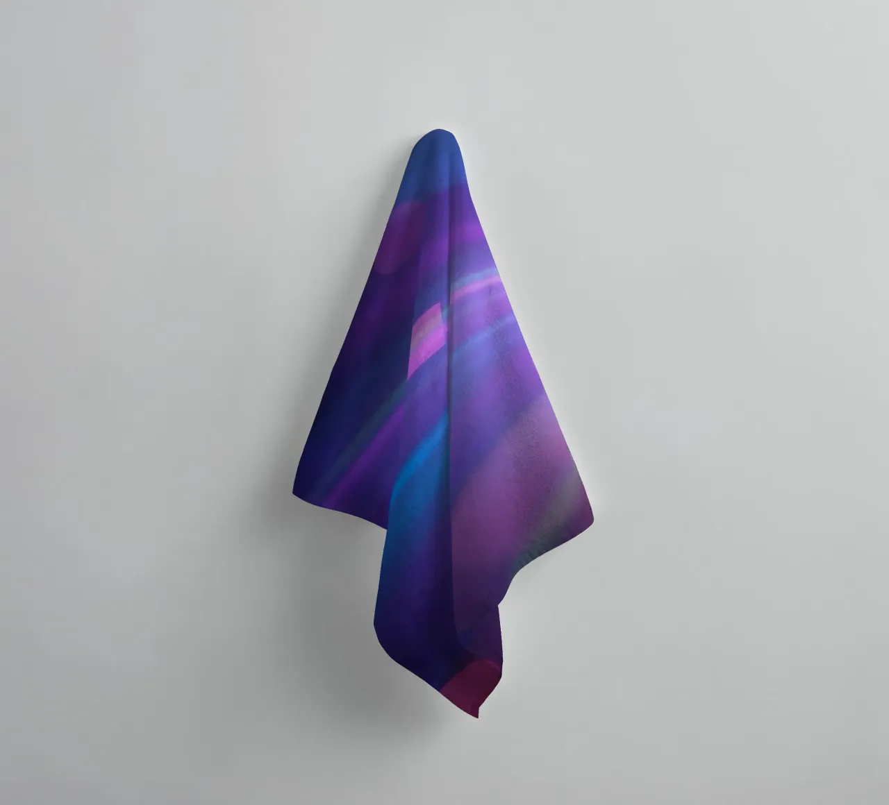 Colorful light rays create a vibrant display in a dark art towel by DesignDoodle