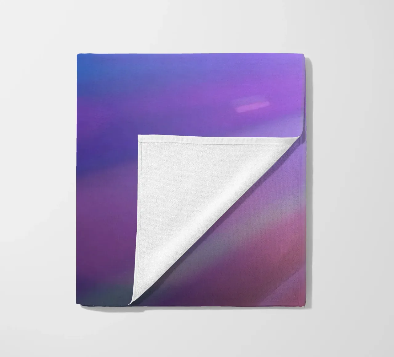 Colorful light rays create a vibrant display in a dark art beach towel by DesignDoodle