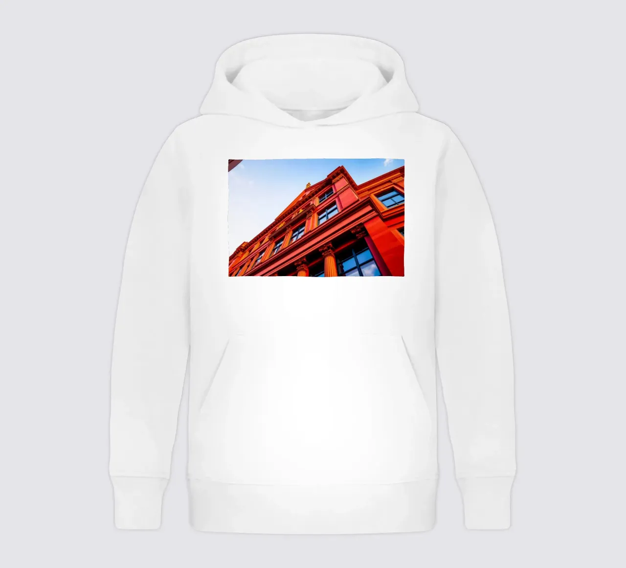 historic building illuminated by sunlight in clear blue sky kids hoodie by DesignDoodle