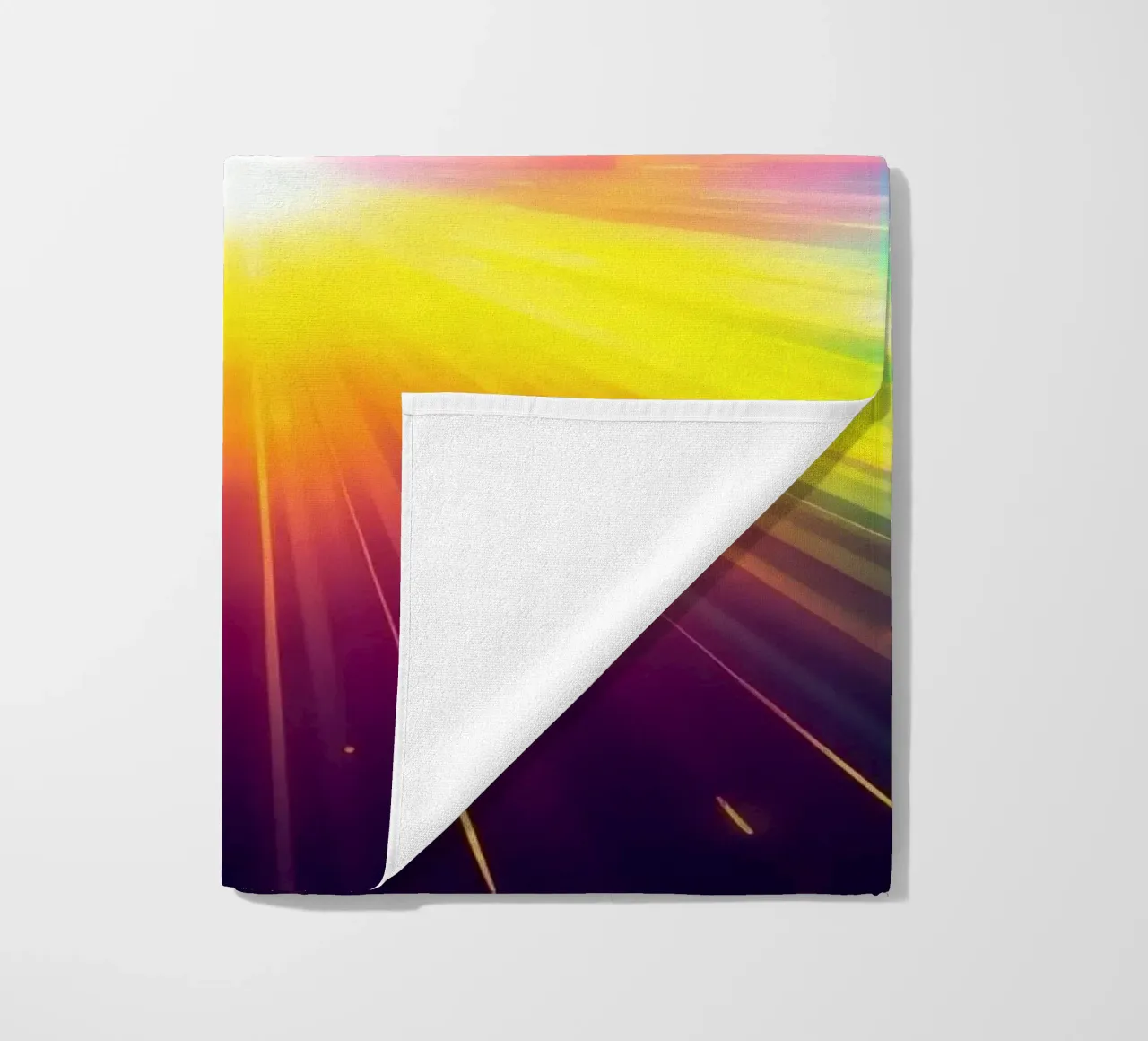 Bright explosion of colors radiating from a central point beach towel by DesignDoodle