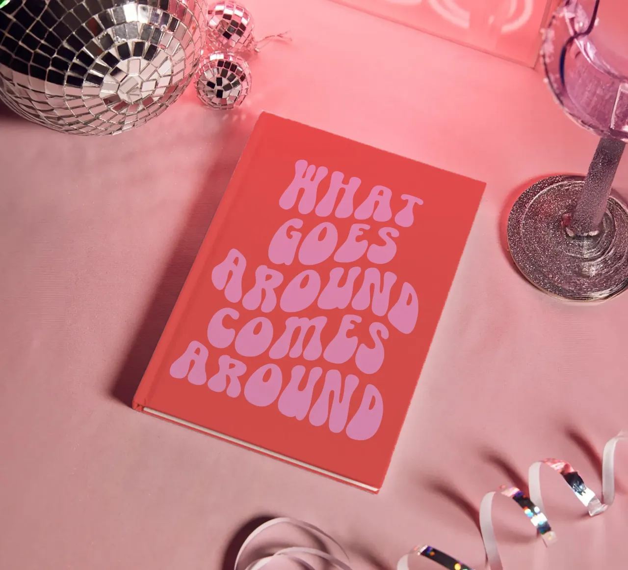 What goes around comes around quote (red tone) notebook by Paigaam Studio
