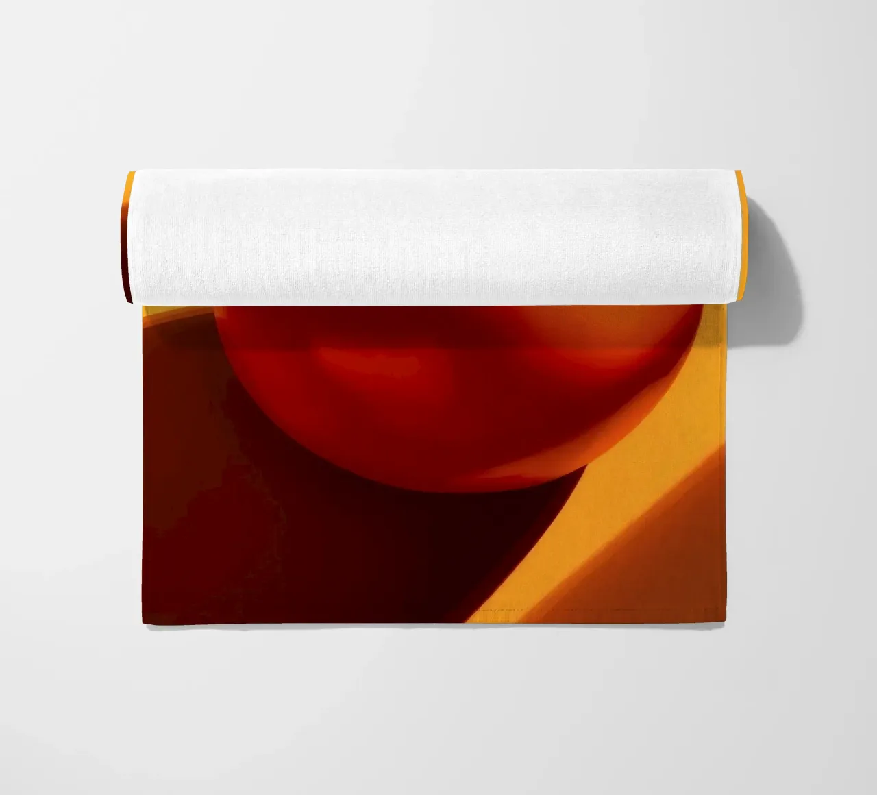 Bright red tomato resting on a warm orange surface beach towel by DesignDoodle
