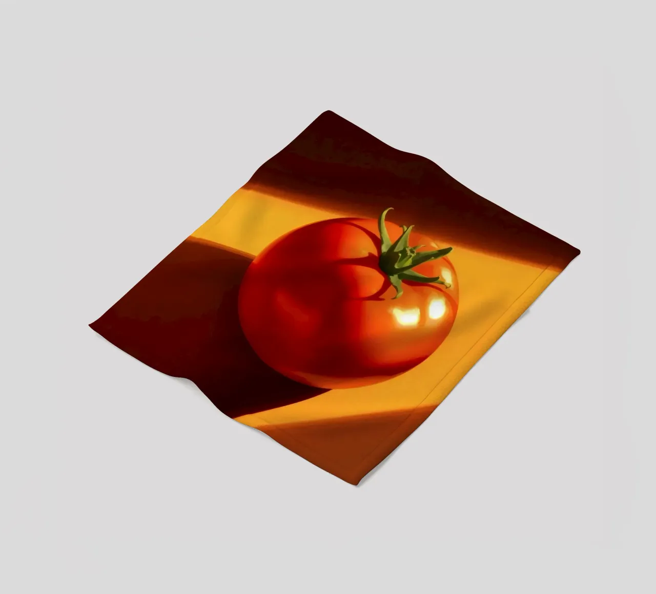 Bright red tomato resting on a warm orange surface fleece blanket by DesignDoodle