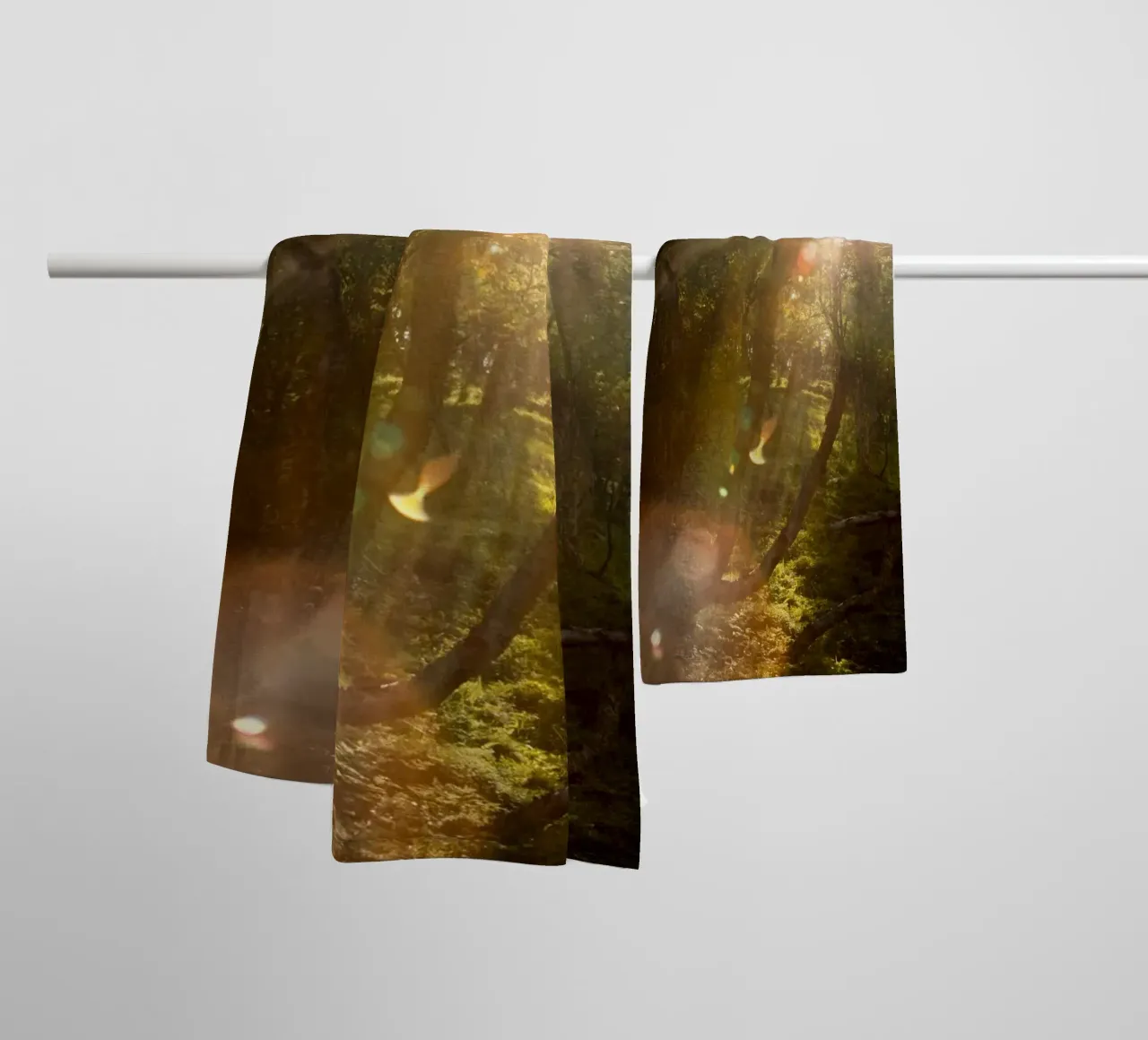 Sunlight streaming through the trees towel by karijn_landscapes