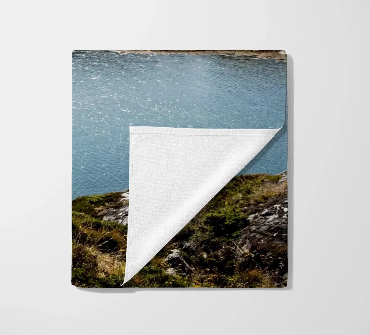 Coastal calm with a blue sky bay beach towel by karijn_landscapes