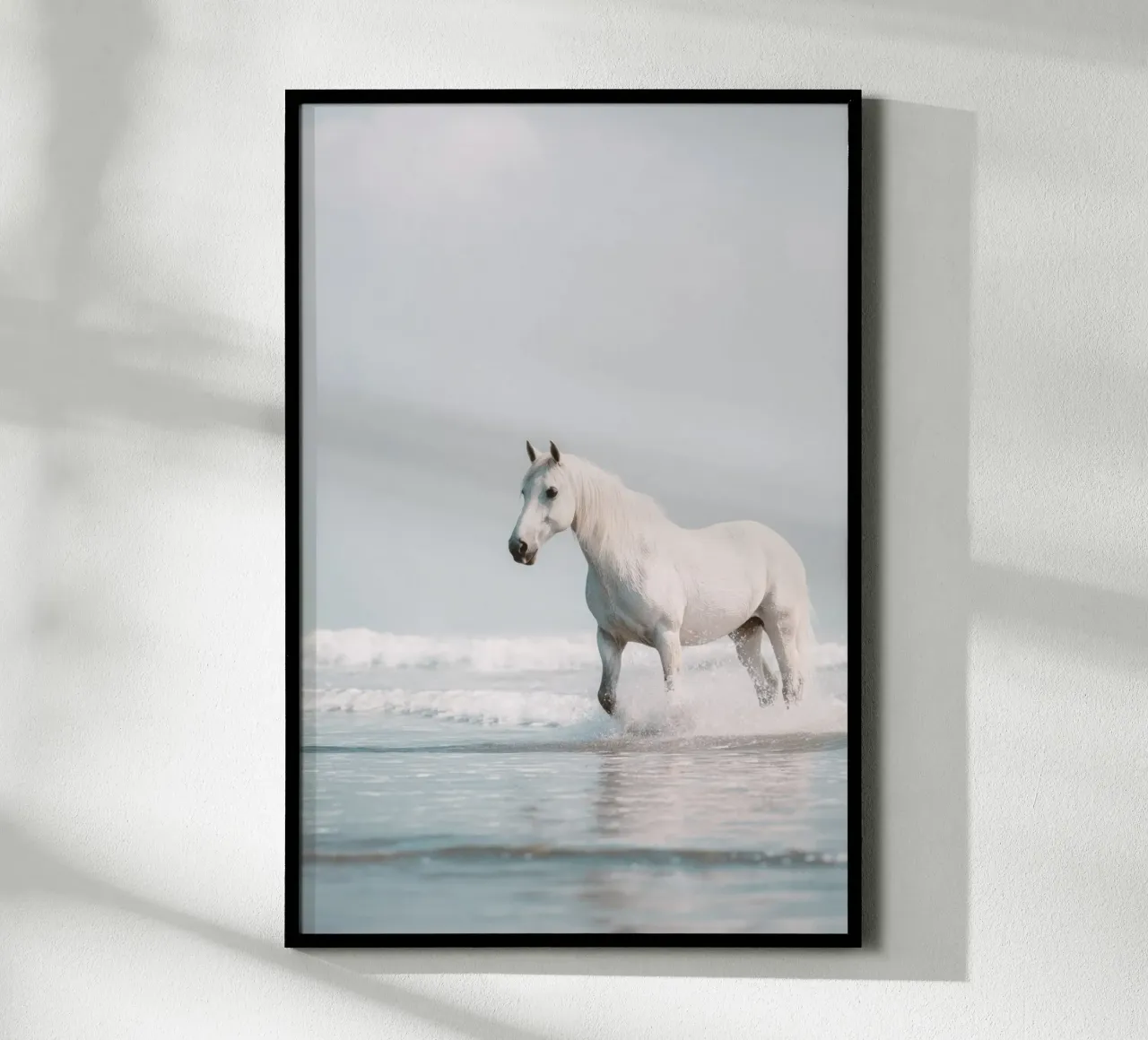 Caballo blanco galopando entre las olas del océano poster de Indigo Tides Art