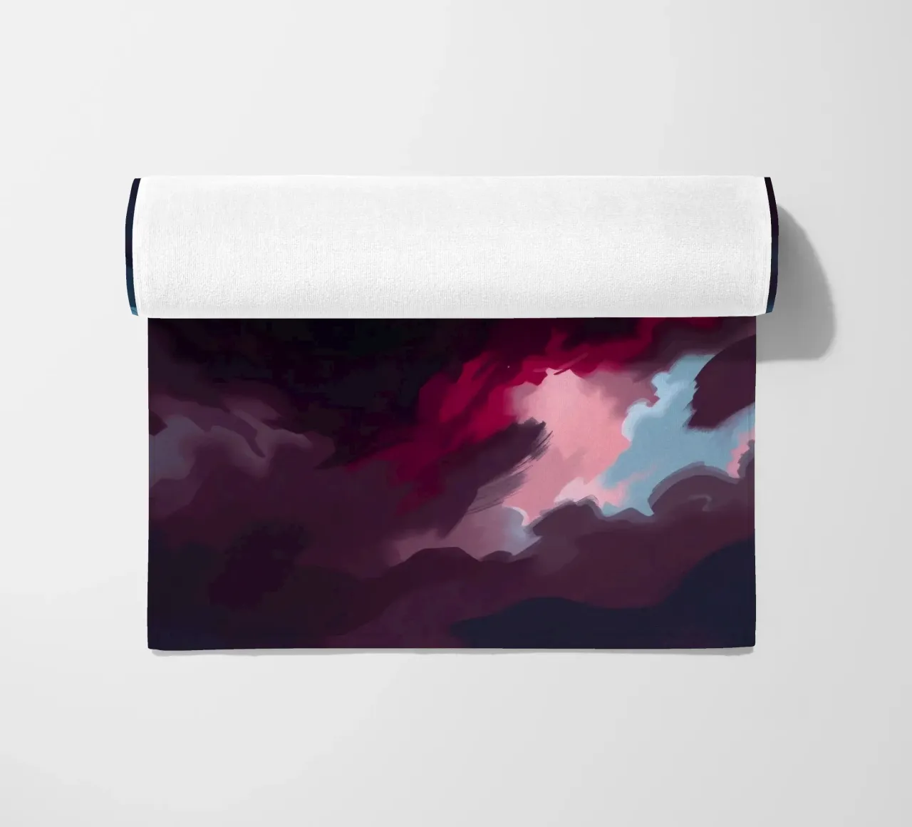 storm clouds swirl overhead at dusk creating a dramatic art beach towel by DesignDoodle