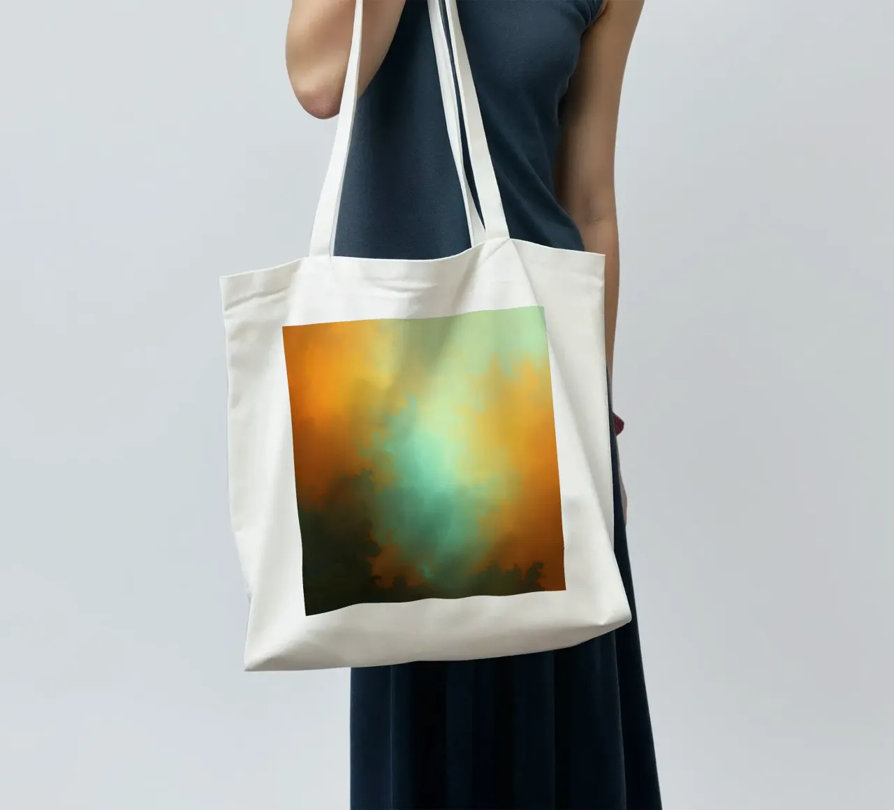 clouds illuminated by the setting sun create a stunning art tote bag by DesignDoodle