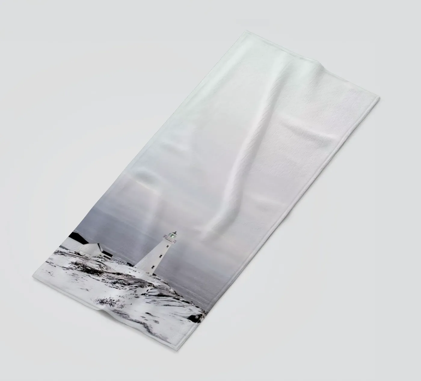 Lighthouse beach towel by EyeEm Mobile GmbH