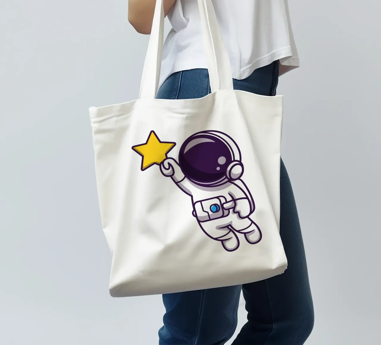 Astronauta che vola e tiene in mano una stella borsa in juta da brockcon Shop
