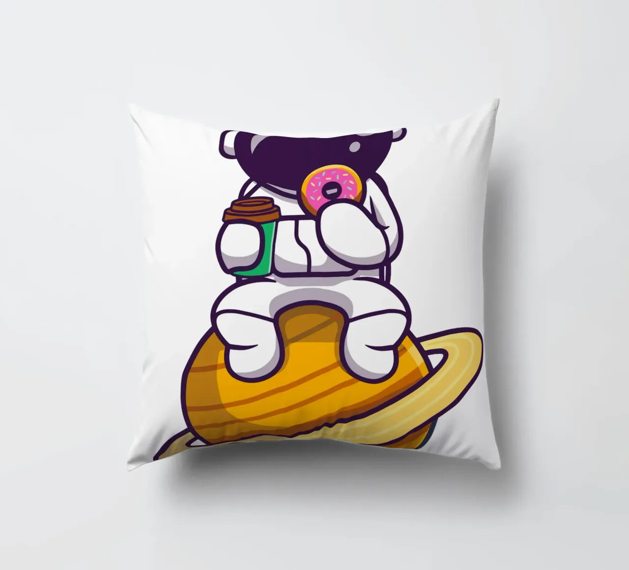 Astronauta carino che mangia una ciambella e tiene in mano una tazza di caffè cuscino da brockcon Shop