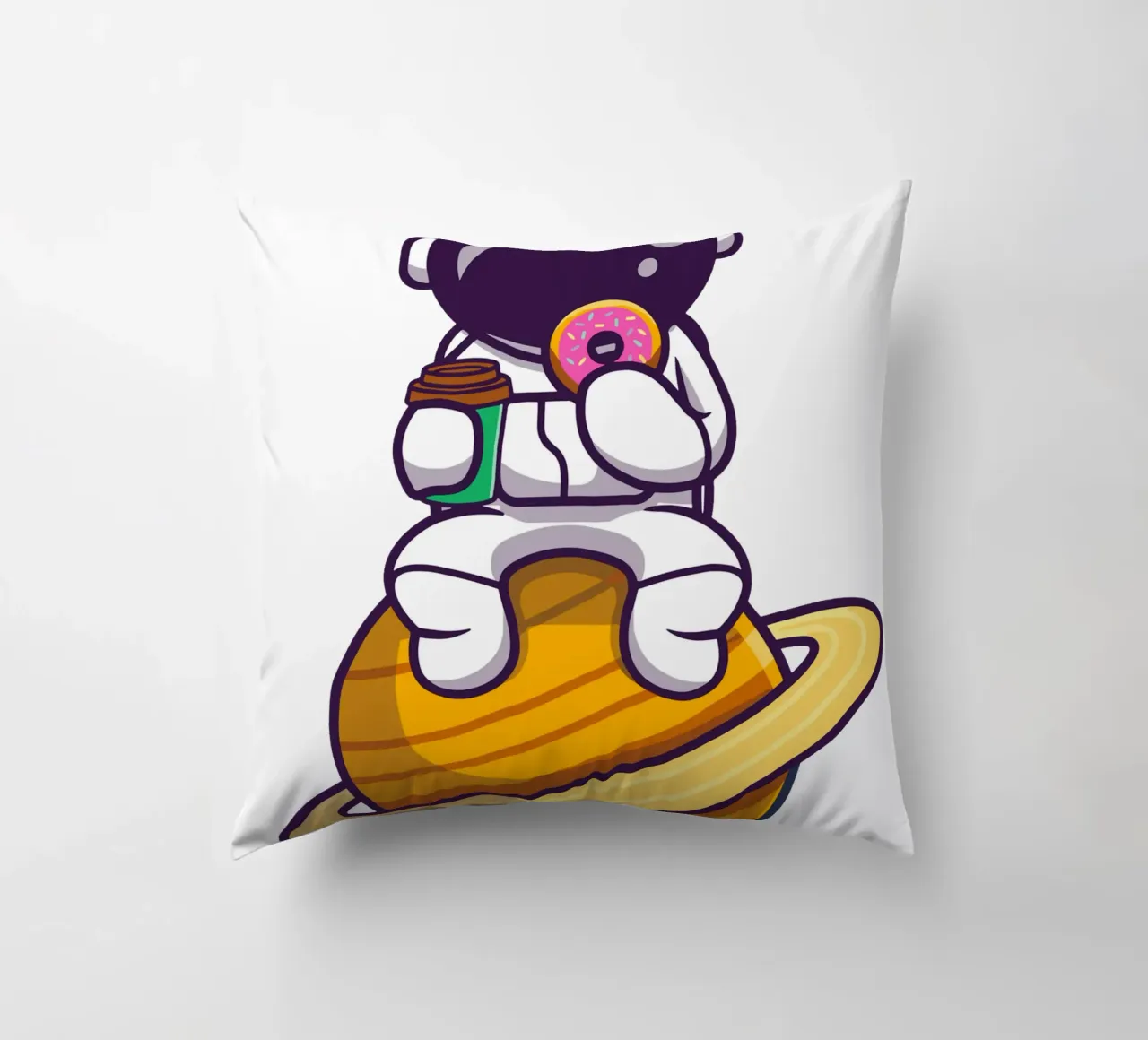Astronauta carino che mangia una ciambella e tiene in mano una tazza di caffè cuscino da brockcon Shop
